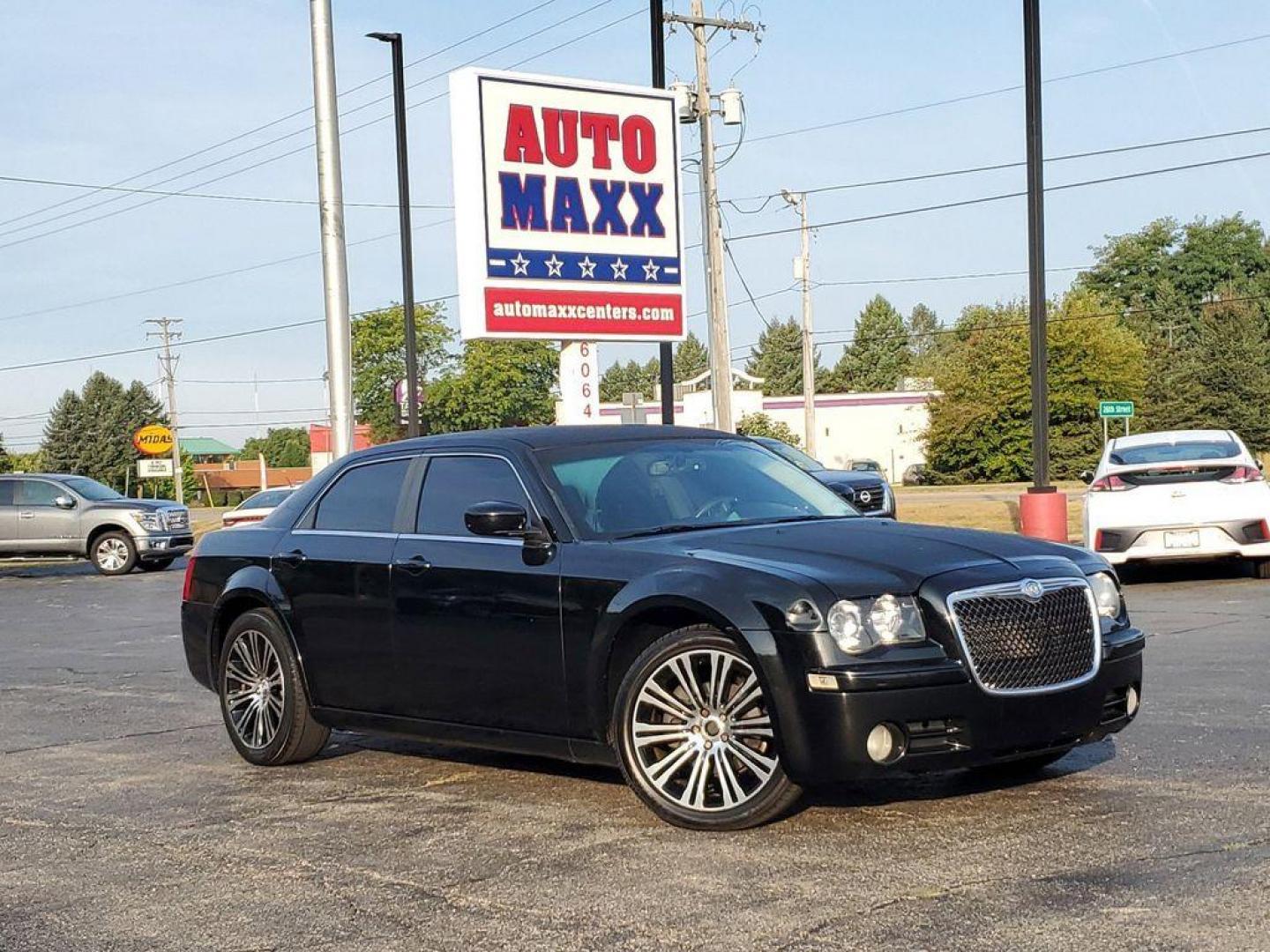 2010 Black Clearcoat /Dark Slate Gray Chrysler 300 S V6 (2C3CA2CVXAH) with an 3.5L V6 SOHC 24V engine, 4-Speed Automatic transmission, located at 6064 Gull Rd, Kalamazoo, MI, 49048, (269) 222-0088, 42.328388, -85.512924 - Discover exceptional value and luxury with our 2010 Chrysler 300 S, a premium sedan that combines style, performance, and comfort. Perfectly maintained and featuring a CARFAX Clean Report, this vehicle is ready to deliver a top-notch driving experience.<br><br>Under the hood, the 300 S boasts a robu - Photo#0