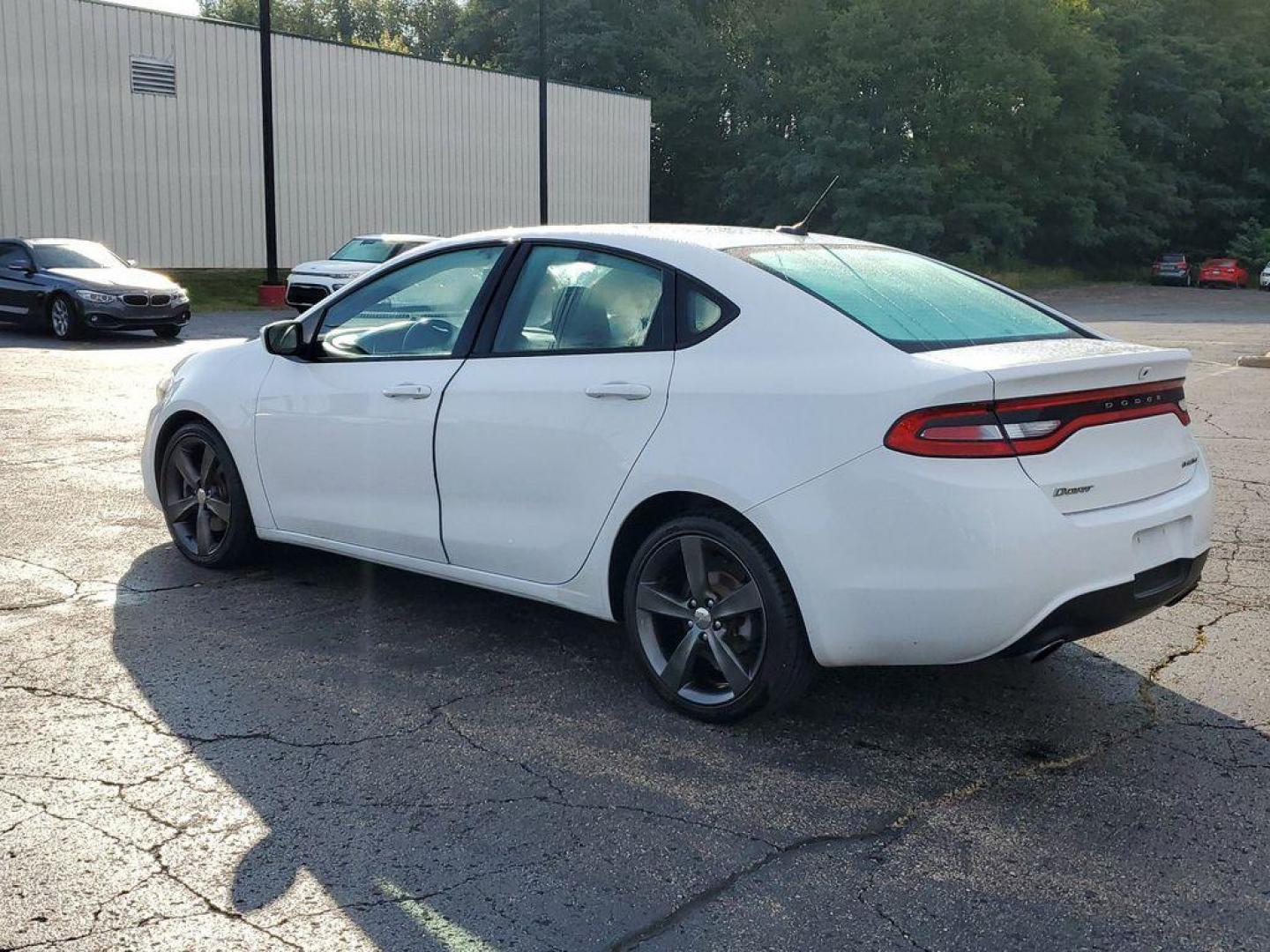 2013 Bright White Clearcoat /Black/Ruby Red Dodge Dart SXT (1C3CDFBA4DD) with an 2.0L L4 DOHC 16V TURBO engine, 6-speed automatic transmission, located at 6064 Gull Rd, Kalamazoo, MI, 49048, (269) 222-0088, 42.328388, -85.512924 - <b>Vehicle Details</b><br>Discover the exceptional value and performance of our 2013 Dodge Dart Rallye, now available at our dealership. This well-maintained sedan features a reliable 4-cylinder, 2.0L engine paired with front-wheel drive, offering a smooth and efficient driving experience. The Dod - Photo#2