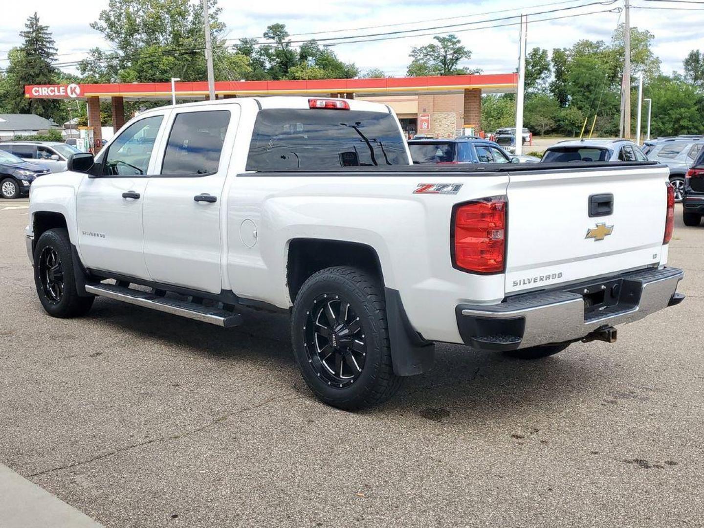 2014 Black /Jet Black Chevrolet Silverado 1500 1LT Crew Cab 4WD (3GCUKREC7EG) with an 5.3L V8 OHV 16V engine, 6-Speed Automatic transmission, located at 234 Columbia Ave, Battle Creek, MI, 49015, (269) 222-0088, 42.298264, -85.192543 - <b>Vehicle Details</b><br>Rev up your excitement for the 2014 Chevrolet Silverado 1500 LT! This powerhouse pickup is built to impress with its robust V8, 5.3L engine that delivers unmatched performance and reliability. Whether you're hauling heavy loads or cruising on the open road, the Silverado's - Photo#2