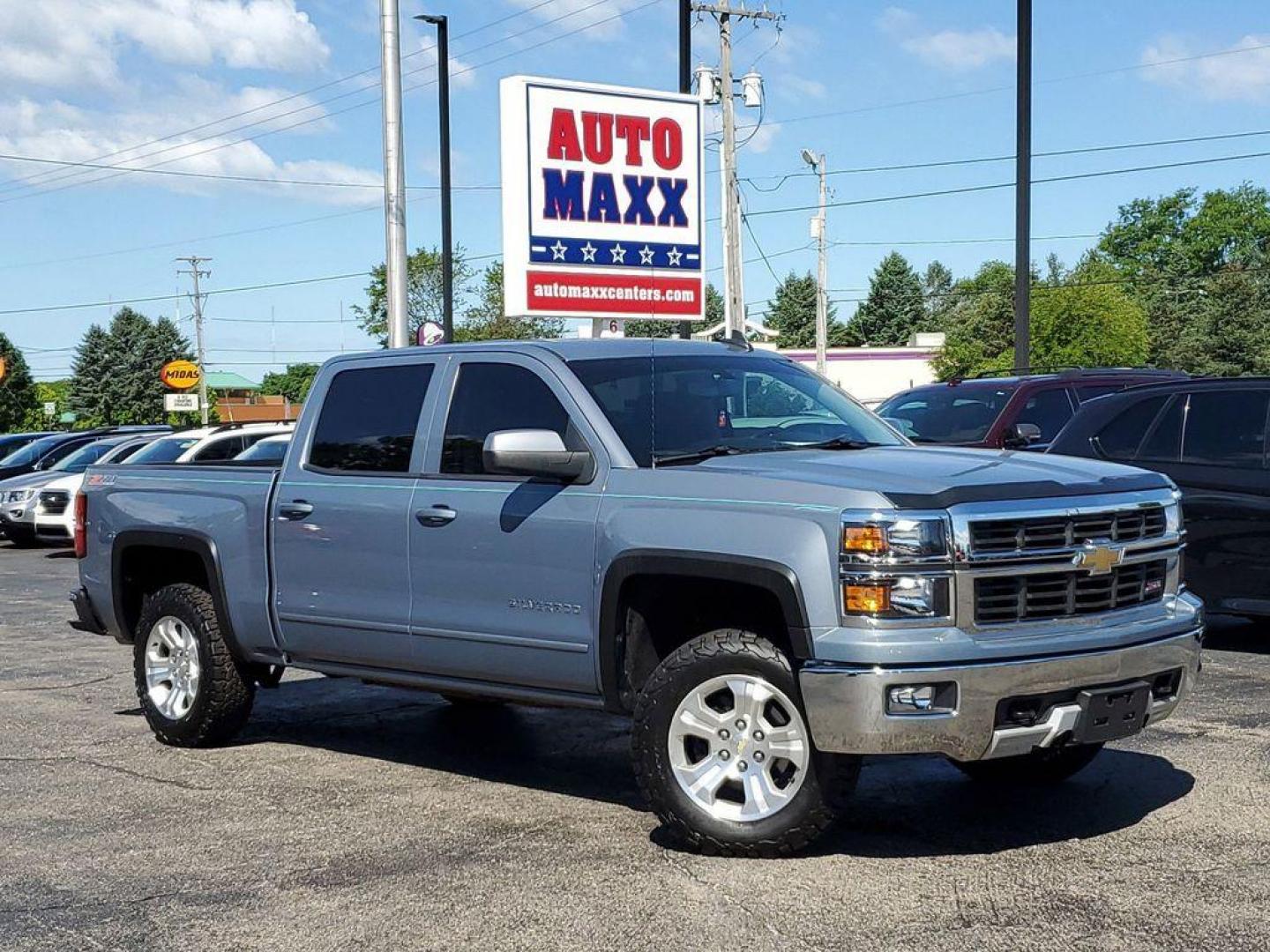 2015 Slate Gray Metallic /Jet Black Chevrolet Silverado 1500 LT Crew Cab 4WD (3GCUKRECXFG) with an 5.3L V8 OHV 16V engine, 6-Speed Automatic transmission, located at 234 Columbia Ave, Battle Creek, MI, 49015, (269) 222-0088, 42.298264, -85.192543 - <b>Vehicle Details</b><br>Introducing the 2015 Chevrolet Silverado 1500 LT, a robust and dependable truck designed to handle both work and play with ease. This well-maintained vehicle comes equipped with a powerful V8, 5.3L engine, offering impressive towing and hauling capabilities. The 4WD system - Photo#0