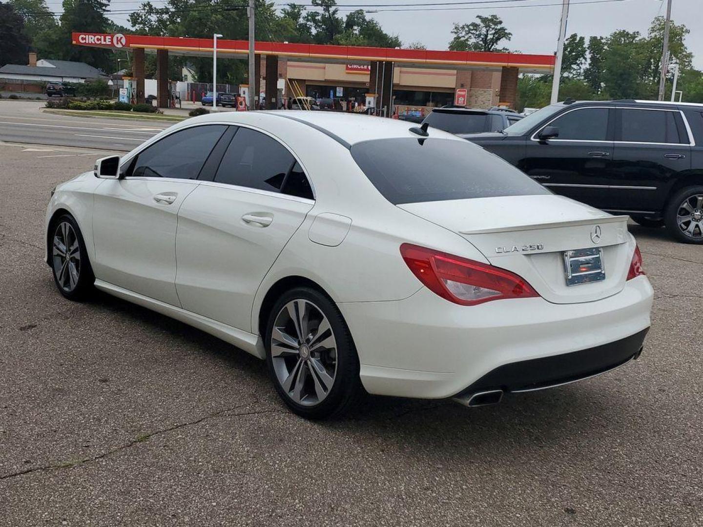 2015 Cirrus White /Black Mercedes-Benz CLA-Class CLA250 (WDDSJ4EB3FN) with an 2.0L L4 DOHC 16V engine, 7-Speed Automatic transmission, located at 234 Columbia Ave, Battle Creek, MI, 49015, (269) 222-0088, 42.298264, -85.192543 - <b>Vehicle Details</b><br>Introducing the 2015 Mercedes-Benz CLA 250, a sophisticated blend of performance and luxury designed for discerning drivers. This sleek, front-wheel-drive sedan is powered by a responsive 4-cylinder, 2.0L turbocharged engine, providing an engaging driving experience with ef - Photo#2