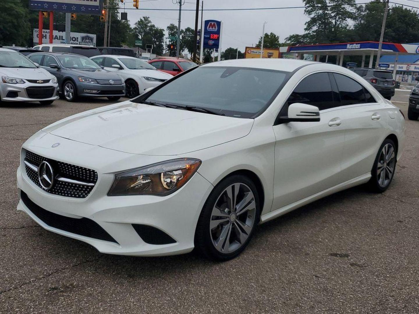 2015 Cirrus White /Black Mercedes-Benz CLA-Class CLA250 (WDDSJ4EB3FN) with an 2.0L L4 DOHC 16V engine, 7-Speed Automatic transmission, located at 234 Columbia Ave, Battle Creek, MI, 49015, (269) 222-0088, 42.298264, -85.192543 - <b>Vehicle Details</b><br>Introducing the 2015 Mercedes-Benz CLA 250, a sophisticated blend of performance and luxury designed for discerning drivers. This sleek, front-wheel-drive sedan is powered by a responsive 4-cylinder, 2.0L turbocharged engine, providing an engaging driving experience with ef - Photo#3