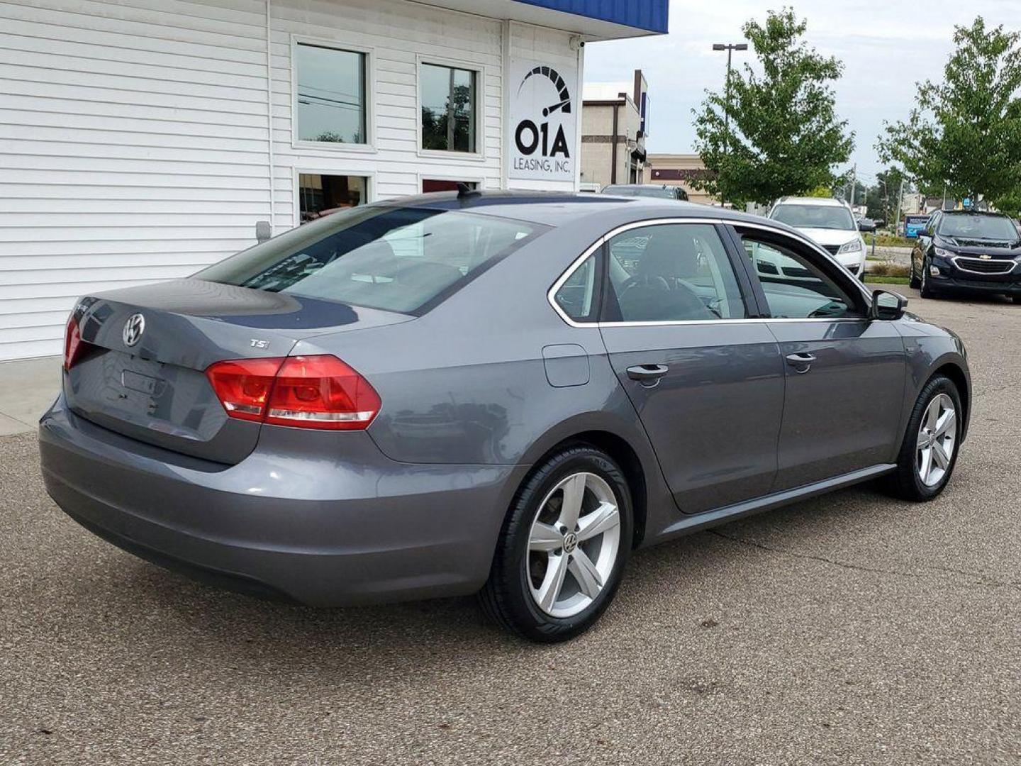 2015 Platinum Gray Metallic /Titan Black Volkswagen Passat Wolfsburg Edition 6A (1VWAT7A32FC) with an 1.8L L4 TURBO DIESEL engine, 6-Speed Automatic transmission, located at 234 Columbia Ave, Battle Creek, MI, 49015, (269) 222-0088, 42.298264, -85.192543 - Discover the perfect blend of style, performance, and technology with this stunning 2015 Volkswagen Passat 1.8T Limited Edition! This exceptional sedan is designed to impress with its sleek exterior and well-crafted interior. Under the hood, you'll find a robust 4-cylinder, 1.8L turbocharged engine - Photo#1