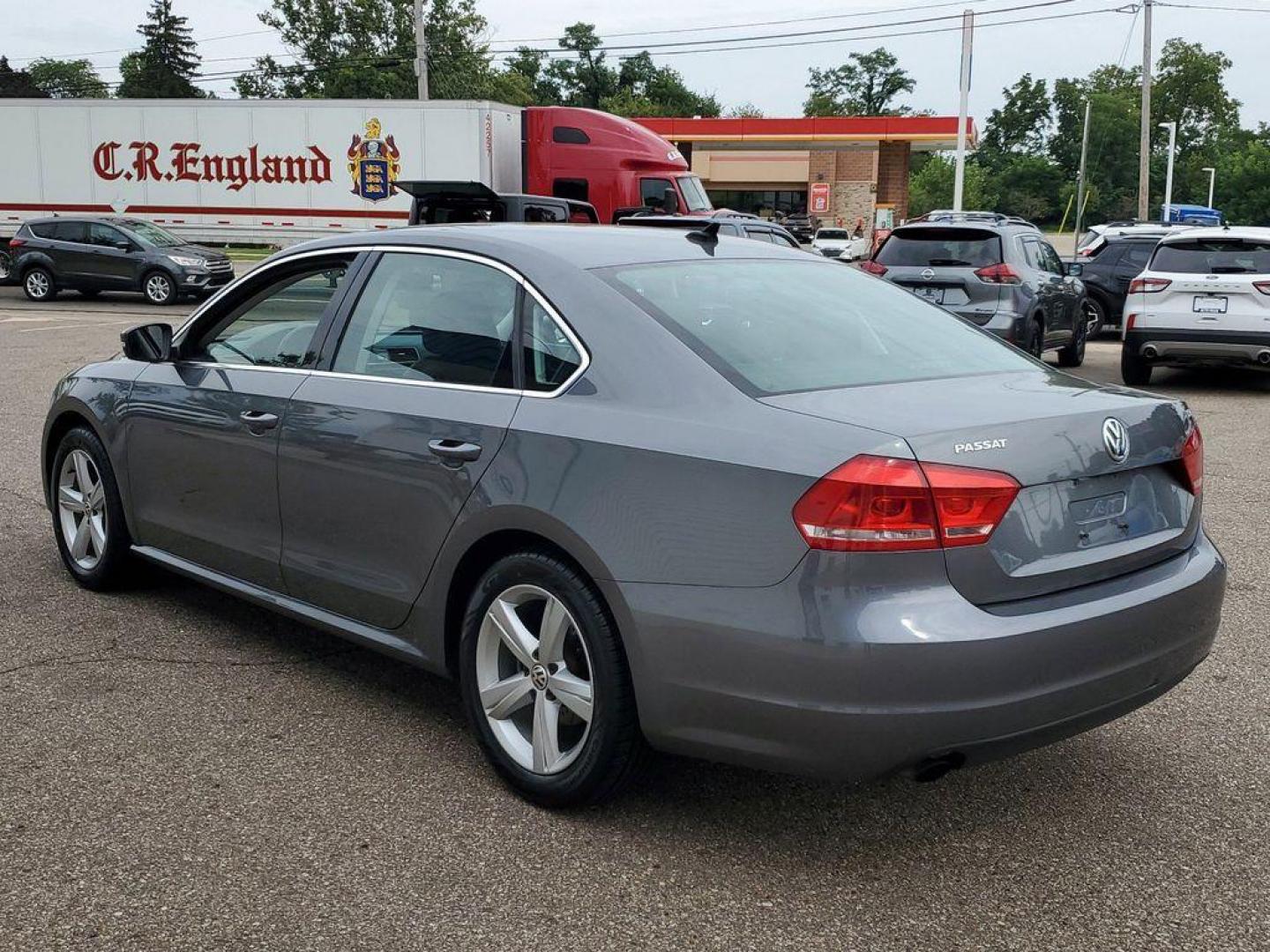 2015 Platinum Gray Metallic /Titan Black Volkswagen Passat Wolfsburg Edition 6A (1VWAT7A32FC) with an 1.8L L4 TURBO DIESEL engine, 6-Speed Automatic transmission, located at 234 Columbia Ave, Battle Creek, MI, 49015, (269) 222-0088, 42.298264, -85.192543 - Discover the perfect blend of style, performance, and technology with this stunning 2015 Volkswagen Passat 1.8T Limited Edition! This exceptional sedan is designed to impress with its sleek exterior and well-crafted interior. Under the hood, you'll find a robust 4-cylinder, 1.8L turbocharged engine - Photo#2