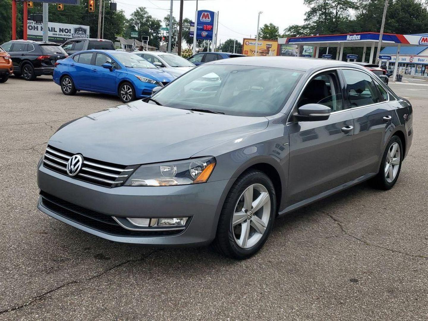 2015 Platinum Gray Metallic /Titan Black Volkswagen Passat Wolfsburg Edition 6A (1VWAT7A32FC) with an 1.8L L4 TURBO DIESEL engine, 6-Speed Automatic transmission, located at 234 Columbia Ave, Battle Creek, MI, 49015, (269) 222-0088, 42.298264, -85.192543 - Discover the perfect blend of style, performance, and technology with this stunning 2015 Volkswagen Passat 1.8T Limited Edition! This exceptional sedan is designed to impress with its sleek exterior and well-crafted interior. Under the hood, you'll find a robust 4-cylinder, 1.8L turbocharged engine - Photo#3