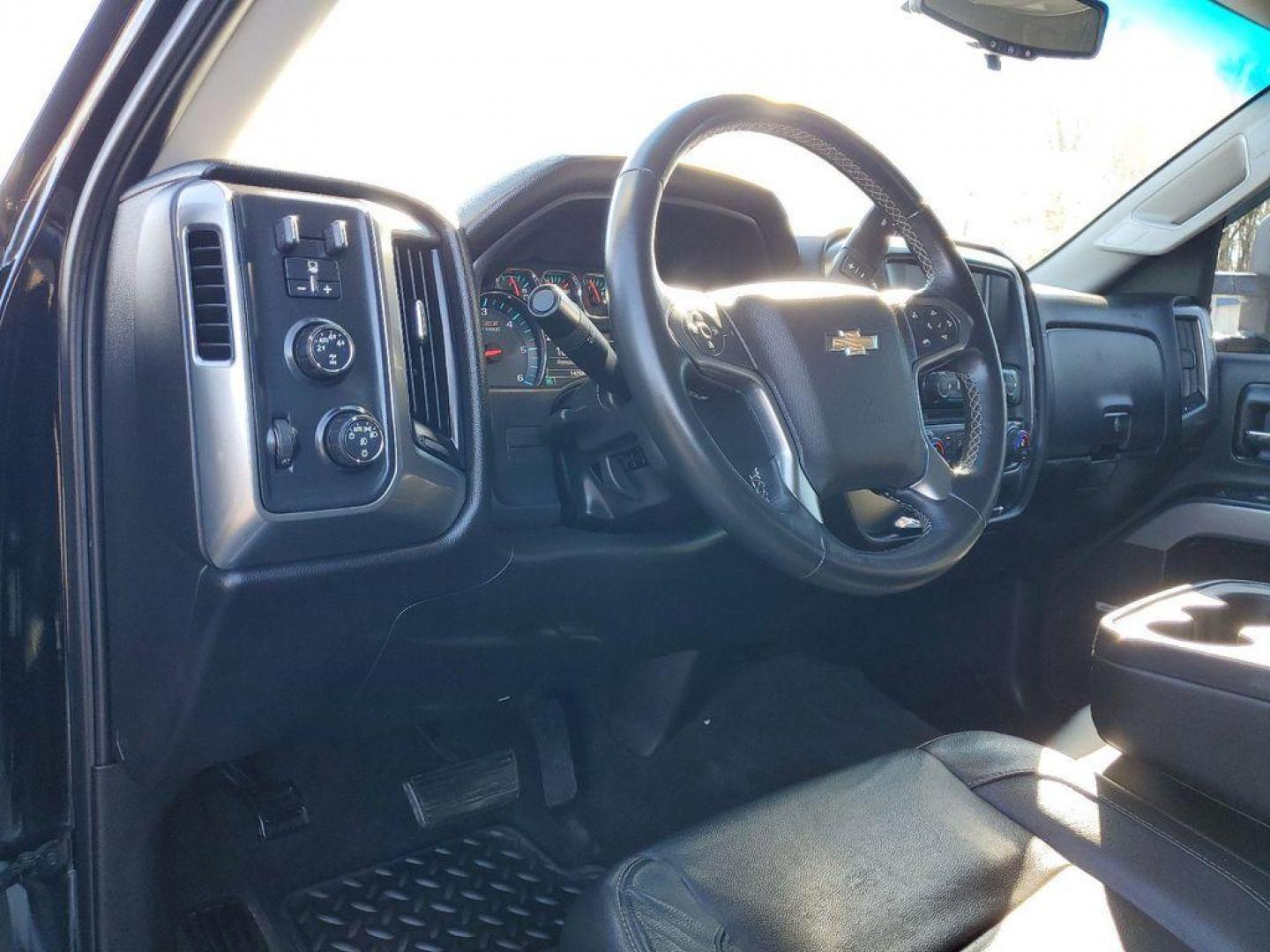 2016 Black /Jet Black Chevrolet Silverado 1500 LT Double Cab 4WD (1GCVKREC7GZ) with an 5.3L V8 OHV 16V engine, 6A transmission, located at 6064 Gull Rd, Kalamazoo, MI, 49048, (269) 222-0088, 42.328388, -85.512924 - <b>Vehicle Details</b><br>Looking for a reliable and powerful truck that can handle any terrain? Look no further than this 2016 Chevrolet Silverado 1500 LT with 4WD and a V8, 5.3L engine. With 142936 miles on the odometer, this truck is ready to take on any challenge you throw its way. Equipped wit - Photo#16