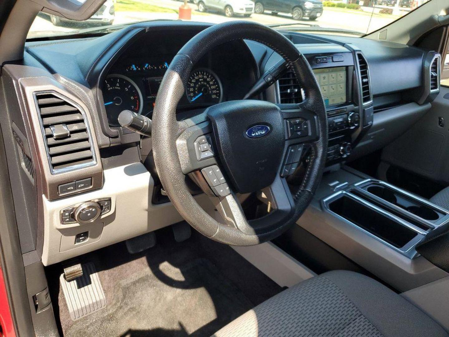 2016 Ruby Red Metallic Tinted Clearcoat /Medium Earth Gray Ford F-150 XL SuperCrew 6.5-ft. Bed 4WD (1FTFW1EG9GK) with an 3.5 V6 engine, 6A transmission, located at 6064 Gull Rd, Kalamazoo, MI, 49048, (269) 222-0088, 42.328388, -85.512924 - <b>Summary</b><br>MAX TRAILER TOW PACKAGE<br>TAILGATE STEP<br><br><b>Vehicle Details</b><br>For Sale: 2016 Ford F-150 XLT 4WD<br><br>Discover the power and reliability of this pre-owned 2016 Ford F-150 XLT, equipped with a robust V6, 3.5L engine and four-wheel drive. Perfect for both work and play, - Photo#11