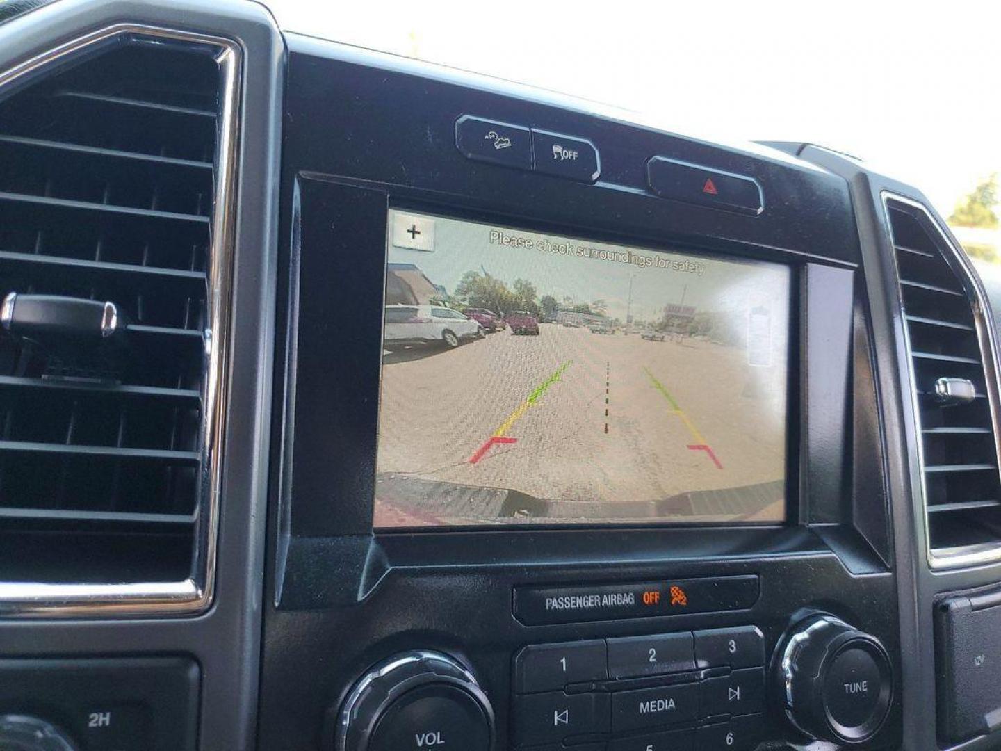 2016 Ruby Red Metallic Tinted Clearcoat /Medium Earth Gray Ford F-150 XL SuperCrew 6.5-ft. Bed 4WD (1FTFW1EG9GK) with an 3.5 V6 engine, 6A transmission, located at 6064 Gull Rd, Kalamazoo, MI, 49048, (269) 222-0088, 42.328388, -85.512924 - <b>Summary</b><br>MAX TRAILER TOW PACKAGE<br>TAILGATE STEP<br><br><b>Vehicle Details</b><br>For Sale: 2016 Ford F-150 XLT 4WD<br><br>Discover the power and reliability of this pre-owned 2016 Ford F-150 XLT, equipped with a robust V6, 3.5L engine and four-wheel drive. Perfect for both work and play, - Photo#19