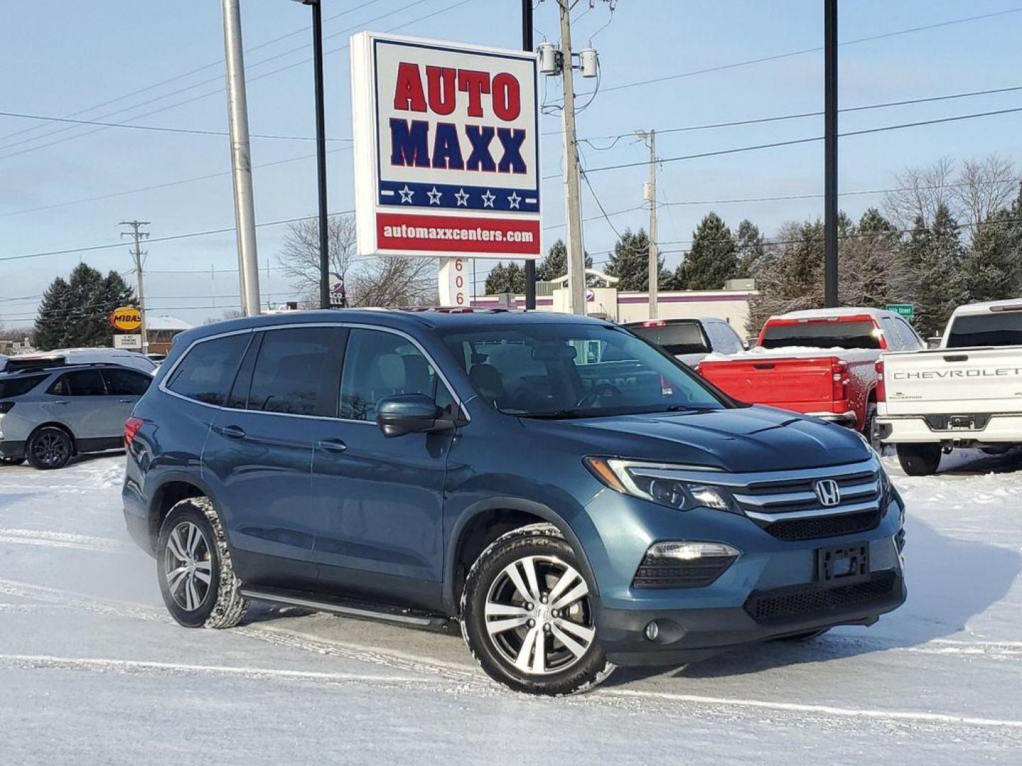 2016 Steel Sapphire Metallic /Beige Honda Pilot EXL 4WD (5FNYF6H56GB) with an 3.5L V6 SOHC 24V engine, 6-Speed Automatic transmission, located at 6064 Gull Rd, Kalamazoo, MI, 49048, (269) 222-0088, 42.328388, -85.512924 - Introducing the impeccable 2016 Honda Pilot EX-L, a remarkable SUV that stands out with its perfect blend of style, performance, and luxury. This vehicle is a pristine gem with 0 miles, ready to embark on countless adventures with its new owner. Under the hood, you'll find a robust V6, 3.5L engine t - Photo#0