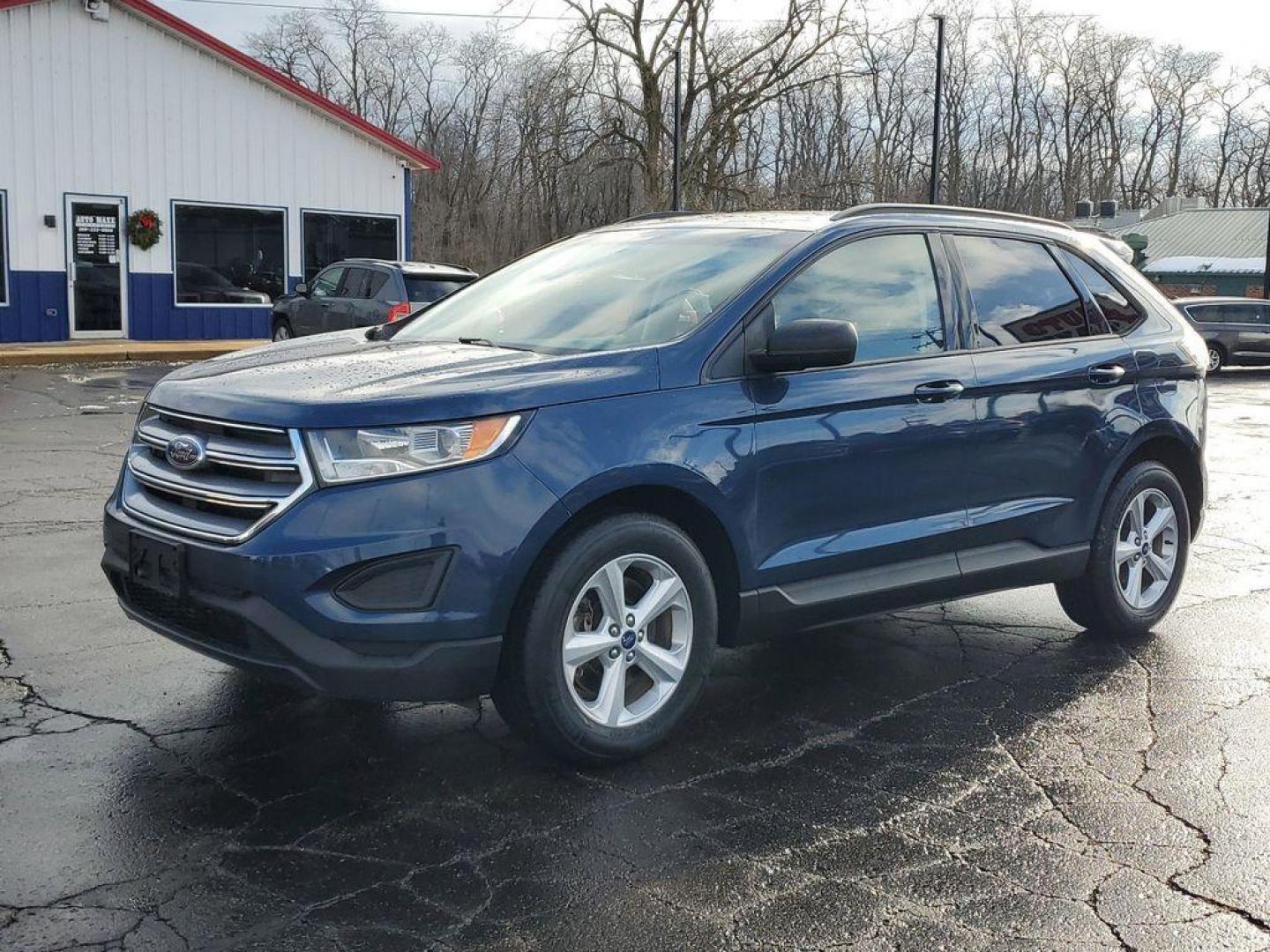 2017 Blue Jeans Metallic /Ebony Ford Edge SE AWD (2FMPK4G93HB) with an 2.0L L4 DOHC 16V engine, 6A transmission, located at 6064 Gull Rd, Kalamazoo, MI, 49048, (269) 222-0088, 42.328388, -85.512924 - Introducing the 2017 Ford Edge SE with All-Wheel Drive, a robust and stylish SUV designed to meet the demands of both city driving and weekend adventures. This model is powered by a fuel-efficient 4-cylinder, 2.0L EcoBoost engine, ensuring a dynamic yet economical driving experience. <br><br>Meticul - Photo#1