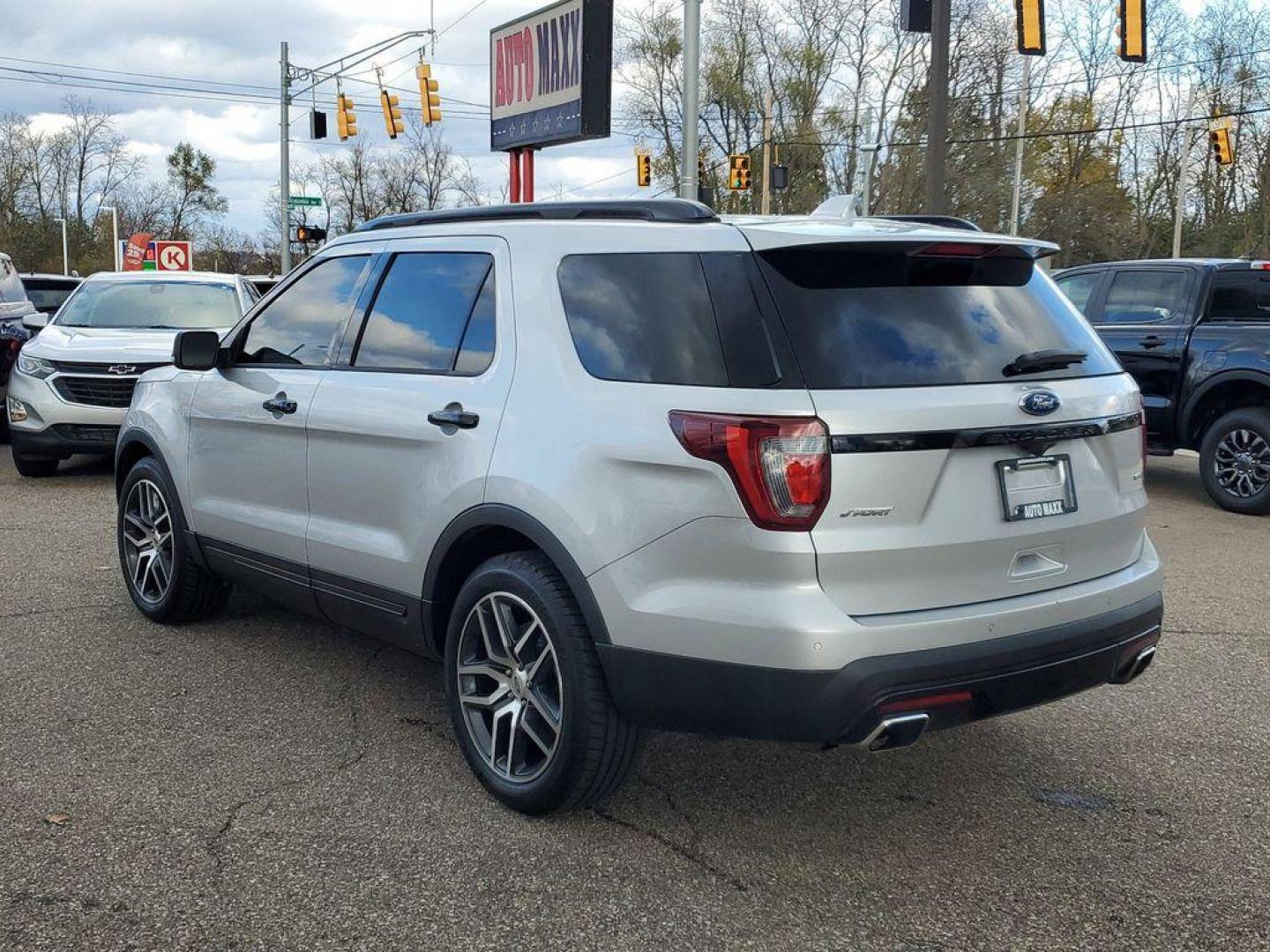 2017 Ingot Silver Metallic /Ebony Black w/Red Accent Stitching Ford Explorer Sport 4WD (1FM5K8GT3HG) with an 3.5L V6 DOHC 24V engine, 6A transmission, located at 234 Columbia Ave, Battle Creek, MI, 49015, (269) 222-0088, 42.298264, -85.192543 - Discover the power and versatility of our 2017 Ford Explorer Sport, now available at our dealership. This remarkable SUV combines rugged capability with refined style, making it the perfect choice for both city driving and off-road adventures.<br><br>Equipped with a robust V6, 3.5L engine, this Expl - Photo#2