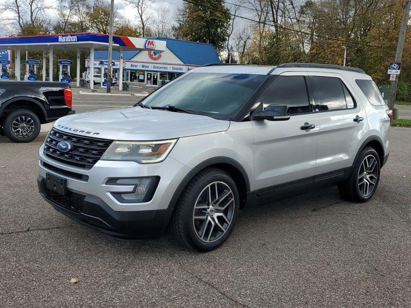 2017 Ingot Silver Metallic /Ebony Black w/Red Accent Stitching Ford Explorer Sport 4WD (1FM5K8GT3HG) with an 3.5L V6 DOHC 24V engine, 6A transmission, located at 234 Columbia Ave, Battle Creek, MI, 49015, (269) 222-0088, 42.298264, -85.192543 - Discover the power and versatility of our 2017 Ford Explorer Sport, now available at our dealership. This remarkable SUV combines rugged capability with refined style, making it the perfect choice for both city driving and off-road adventures.<br><br>Equipped with a robust V6, 3.5L engine, this Expl - Photo#3