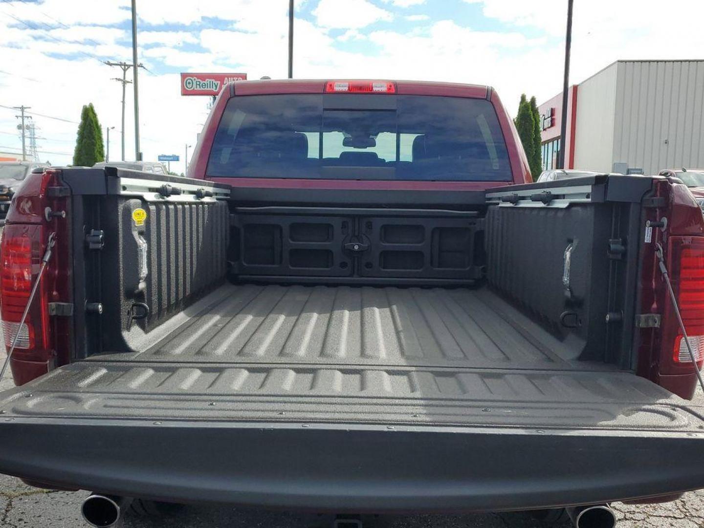 2017 Red Pearl /Black RAM 1500 Sport Crew Cab SWB 4WD (1C6RR7MT0HS) with an 5.7L V8 OHV 16V engine, 8A transmission, located at 6064 Gull Rd, Kalamazoo, MI, 49048, (269) 222-0088, 42.328388, -85.512924 - <b>Vehicle Details</b><br>Introducing the 2017 Ram 1500 Sport, a robust and versatile pickup designed to meet the demands of both work and play. This 4WD powerhouse is equipped with a formidable 5.7L V8 engine, delivering impressive performance and reliability. The Ram 1500 Sport seamlessly blends s - Photo#7