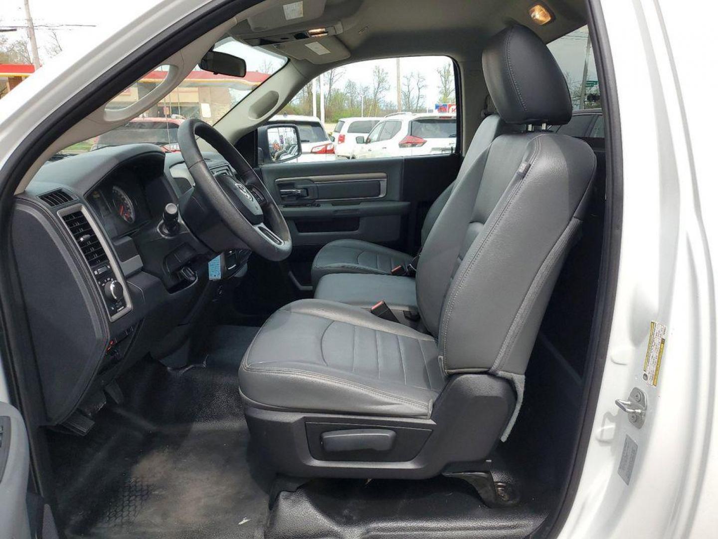 2017 Bright White Clearcoat /Diesel Gray/Black RAM 1500 Tradesman Regular Cab LWB 2WD (3C6JR6DG6HG) with an 3.6L V6 DOHC 24V FFV engine, 8A transmission, located at 234 Columbia Ave, Battle Creek, MI, 49015, (269) 222-0088, 42.298264, -85.192543 - <b>Vehicle Details</b><br>This 2017 Ram 1500 Tradesman is the perfect workhorse truck for any job. With 101,283 miles on the odometer, this reliable vehicle is equipped with rear-wheel drive and a powerful V6, 3.6L engine. Stay connected on the go with hands-free Bluetooth technology, allowing you - Photo#8