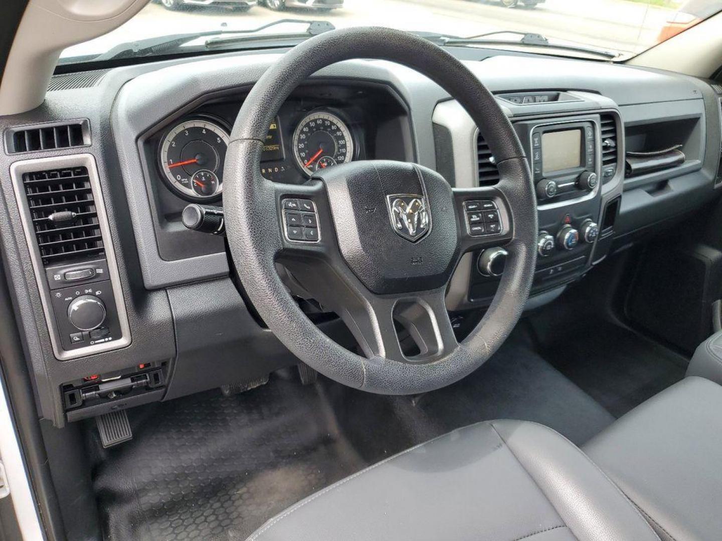 2017 Bright White Clearcoat /Diesel Gray/Black RAM 1500 Tradesman Regular Cab LWB 2WD (3C6JR6DG6HG) with an 3.6L V6 DOHC 24V FFV engine, 8A transmission, located at 234 Columbia Ave, Battle Creek, MI, 49015, (269) 222-0088, 42.298264, -85.192543 - <b>Vehicle Details</b><br>This 2017 Ram 1500 Tradesman is the perfect workhorse truck for any job. With 101,283 miles on the odometer, this reliable vehicle is equipped with rear-wheel drive and a powerful V6, 3.6L engine. Stay connected on the go with hands-free Bluetooth technology, allowing you - Photo#11