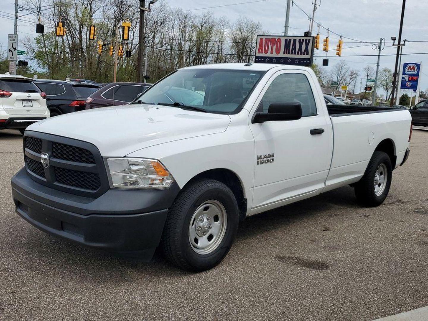 2017 Bright White Clearcoat /Diesel Gray/Black RAM 1500 Tradesman Regular Cab LWB 2WD (3C6JR6DG6HG) with an 3.6L V6 DOHC 24V FFV engine, 8A transmission, located at 234 Columbia Ave, Battle Creek, MI, 49015, (269) 222-0088, 42.298264, -85.192543 - <b>Vehicle Details</b><br>This 2017 Ram 1500 Tradesman is the perfect workhorse truck for any job. With 101,283 miles on the odometer, this reliable vehicle is equipped with rear-wheel drive and a powerful V6, 3.6L engine. Stay connected on the go with hands-free Bluetooth technology, allowing you - Photo#3