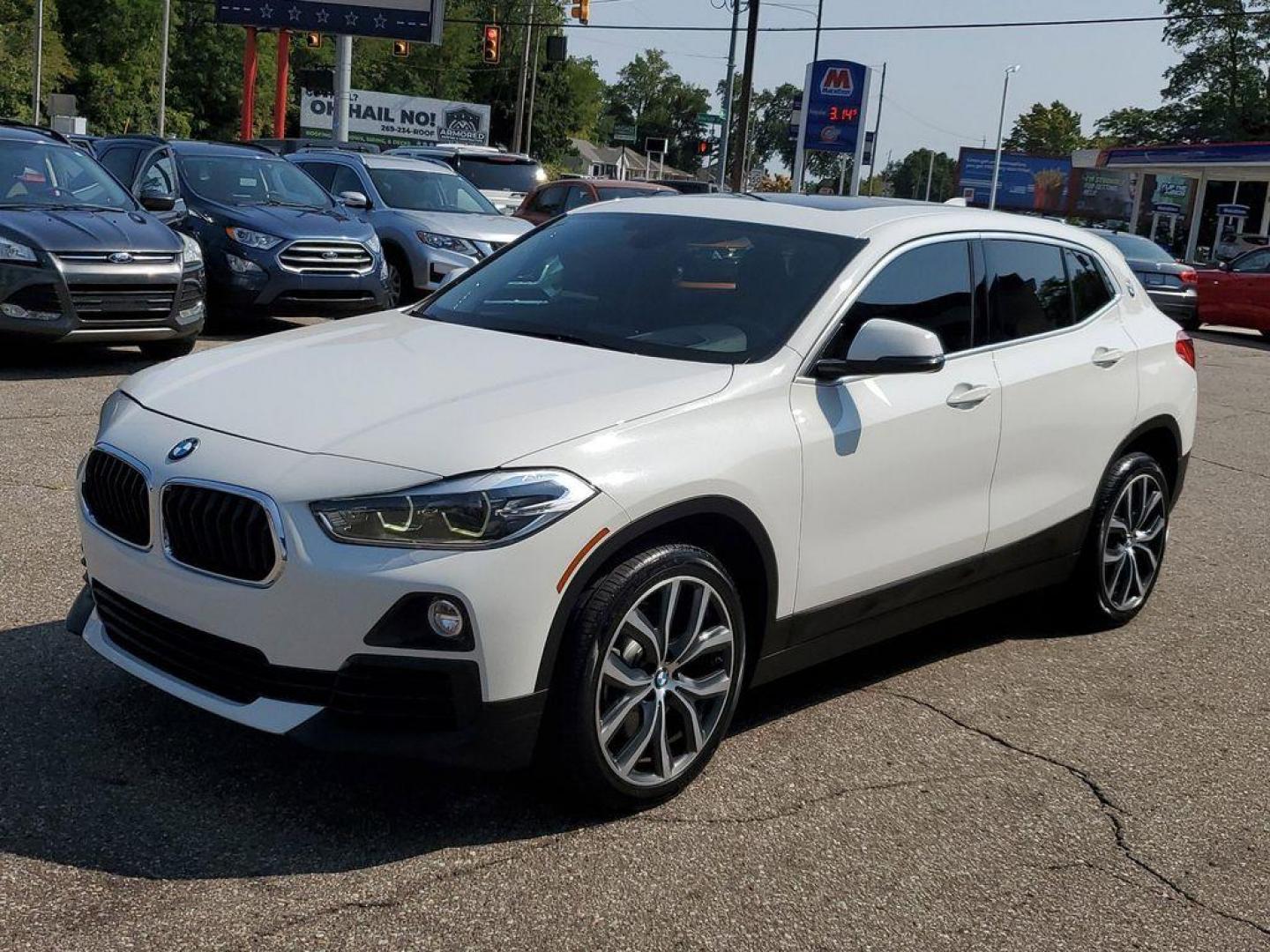 2018 Alpine White /Black BMW X2 xDrive28i (WBXYJ5C35JE) with an 2.0L L4 DOHC 16V engine, 8A transmission, located at 234 Columbia Ave, Battle Creek, MI, 49015, (269) 222-0088, 42.298264, -85.192543 - <b>Vehicle Details</b><br>Experience the thrill of driving with this stunning 2018 BMW X2 xDrive28i! This exceptional compact SUV combines BMW's hallmark performance and luxury, featuring a powerful 2.0L 4-cylinder engine and advanced all-wheel drive (AWD) system. Whether you're navigating city stre - Photo#3