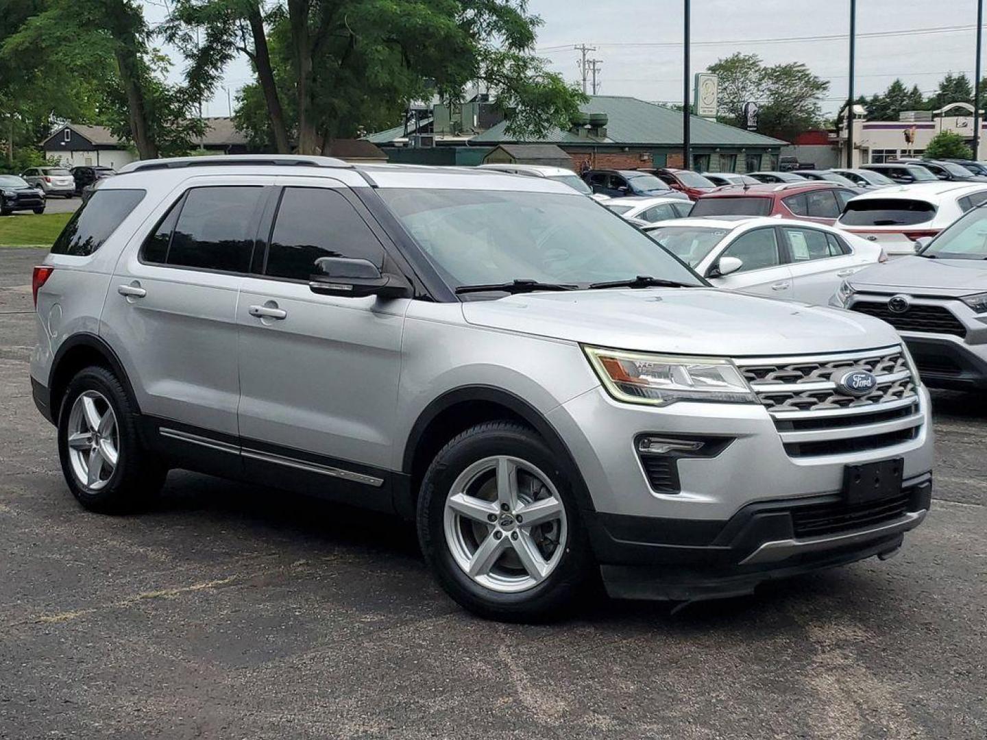 2018 Ingot Silver Metallic /Ebony Black Ford Explorer XLT FWD (1FM5K7D86JG) with an 3.5L V6 DOHC 24V engine, 6A transmission, located at 234 Columbia Ave, Battle Creek, MI, 49015, (269) 222-0088, 42.298264, -85.192543 - <b>Vehicle Details</b><br>Experience adventure and comfort like never before with this exceptional 2018 Ford Explorer XLT! A marvel in engineering, this SUV boasts a powerful V6, 3.5L engine paired with Front-Wheel Drive, ensuring robust performance and smooth handling on every journey. Step insid - Photo#0