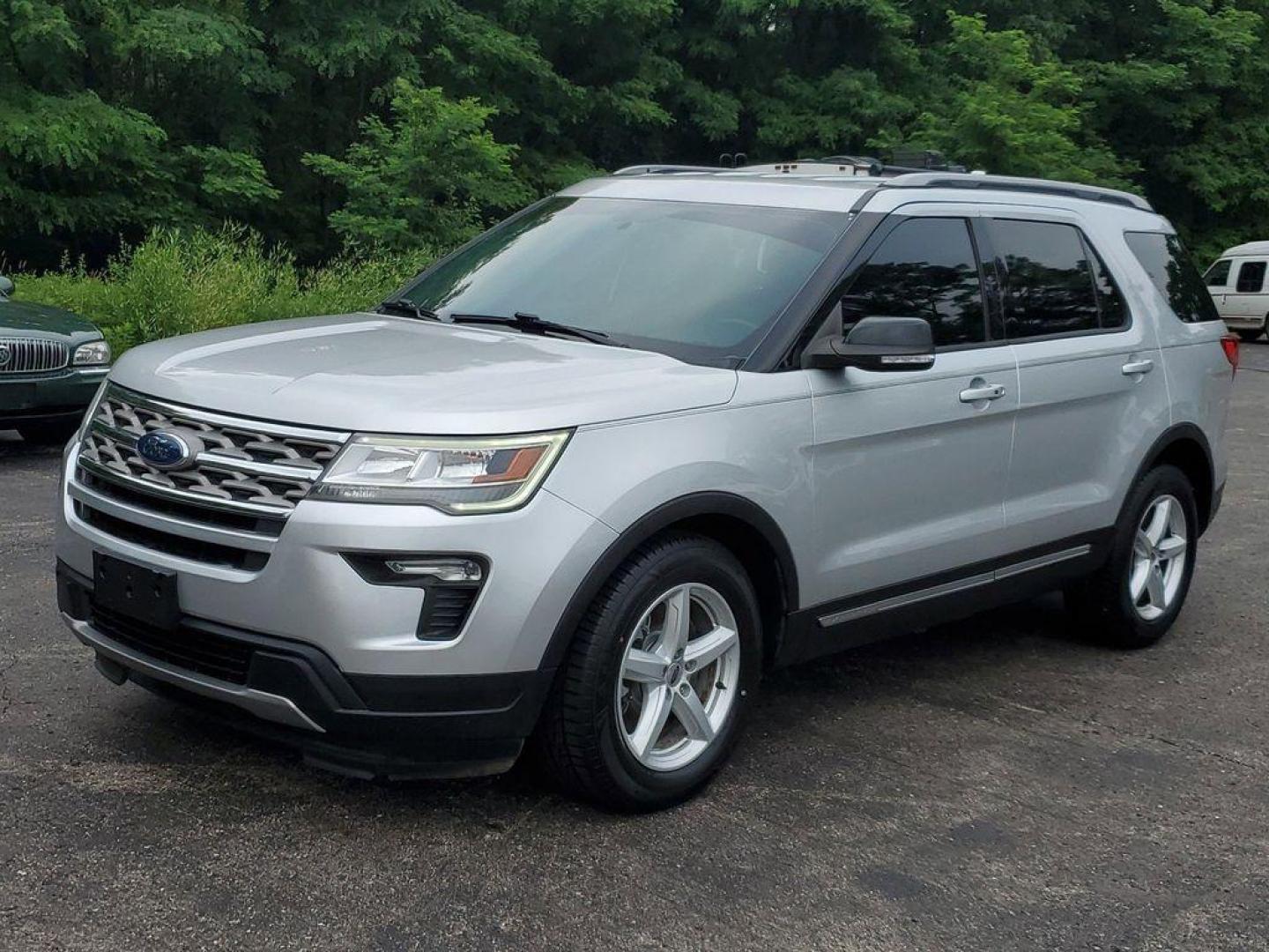 2018 Ingot Silver Metallic /Ebony Black Ford Explorer XLT FWD (1FM5K7D86JG) with an 3.5L V6 DOHC 24V engine, 6A transmission, located at 234 Columbia Ave, Battle Creek, MI, 49015, (269) 222-0088, 42.298264, -85.192543 - <b>Vehicle Details</b><br>Experience adventure and comfort like never before with this exceptional 2018 Ford Explorer XLT! A marvel in engineering, this SUV boasts a powerful V6, 3.5L engine paired with Front-Wheel Drive, ensuring robust performance and smooth handling on every journey. Step insid - Photo#3