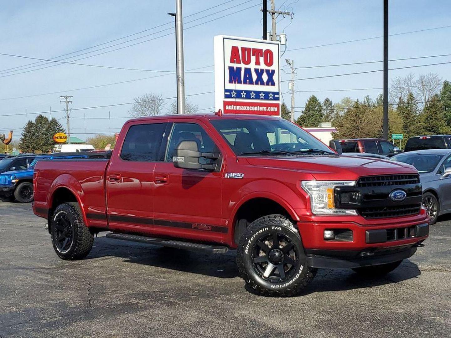 2018 Ruby Red Metallic Tinted Clearcoat /Black Ford F-150 XLT SuperCrew 5.5-ft. Bed 4WD (1FTFW1EG8JF) with an 3.5 V6 engine, 6A transmission, located at 6064 Gull Rd, Kalamazoo, MI, 49048, (269) 222-0088, 42.328388, -85.512924 - <b>Vehicle Details</b><br>Looking for a reliable and versatile truck? Look no further than this 2018 Ford F-150 XLT with 4WD and a powerful V6, 3.5L engine. With only 85472 miles on the odometer, this truck is ready to tackle any job you throw its way. Equipped with XM Radio and Satellite Radio, yo - Photo#0