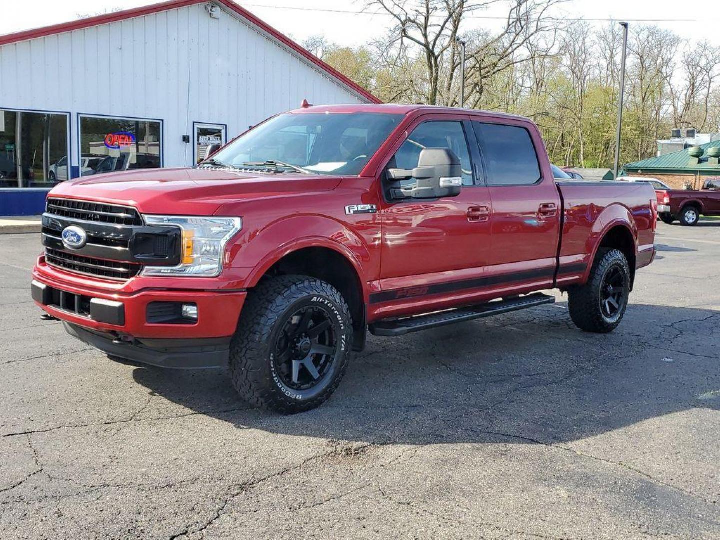 2018 Ruby Red Metallic Tinted Clearcoat /Black Ford F-150 XLT SuperCrew 5.5-ft. Bed 4WD (1FTFW1EG8JF) with an 3.5 V6 engine, 6A transmission, located at 6064 Gull Rd, Kalamazoo, MI, 49048, (269) 222-0088, 42.328388, -85.512924 - <b>Vehicle Details</b><br>Looking for a reliable and versatile truck? Look no further than this 2018 Ford F-150 XLT with 4WD and a powerful V6, 3.5L engine. With only 85472 miles on the odometer, this truck is ready to tackle any job you throw its way. Equipped with XM Radio and Satellite Radio, yo - Photo#1