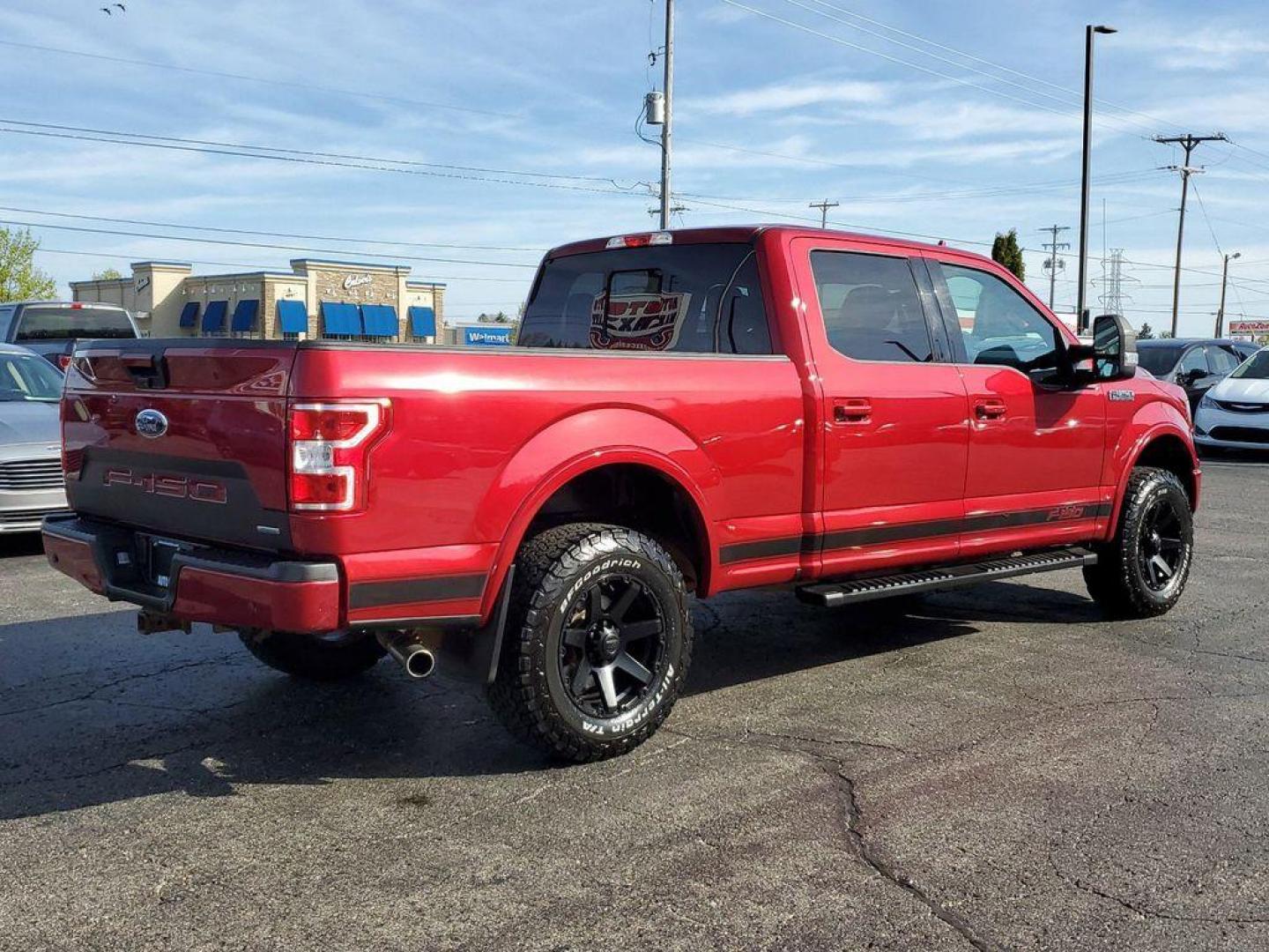 2018 Ruby Red Metallic Tinted Clearcoat /Black Ford F-150 XLT SuperCrew 5.5-ft. Bed 4WD (1FTFW1EG8JF) with an 3.5 V6 engine, 6A transmission, located at 6064 Gull Rd, Kalamazoo, MI, 49048, (269) 222-0088, 42.328388, -85.512924 - <b>Vehicle Details</b><br>Looking for a reliable and versatile truck? Look no further than this 2018 Ford F-150 XLT with 4WD and a powerful V6, 3.5L engine. With only 85472 miles on the odometer, this truck is ready to tackle any job you throw its way. Equipped with XM Radio and Satellite Radio, yo - Photo#3