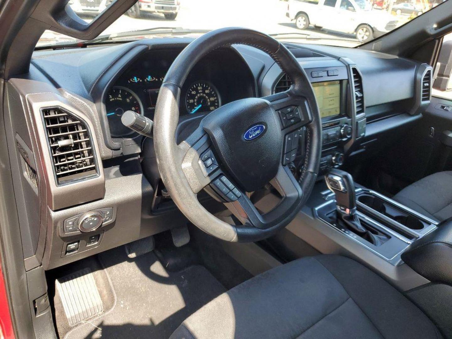 2018 Ruby Red Metallic Tinted Clearcoat /Black Ford F-150 XLT SuperCrew 6.5-ft. Bed 4WD (1FTEW1EP9JF) with an 2.7L V6 DOHC 24V engine, 6A transmission, located at 234 Columbia Ave, Battle Creek, MI, 49015, (269) 222-0088, 42.298264, -85.192543 - Get ready to conquer the road with this outstanding 2018 Ford F-150 XLT 4WD! This powerhouse is equipped with a robust V6, 2.7L engine, delivering impressive performance and efficiency. Whether you're tackling rugged terrains or cruising through city streets, the F-150 XLT is designed to handle it a - Photo#11