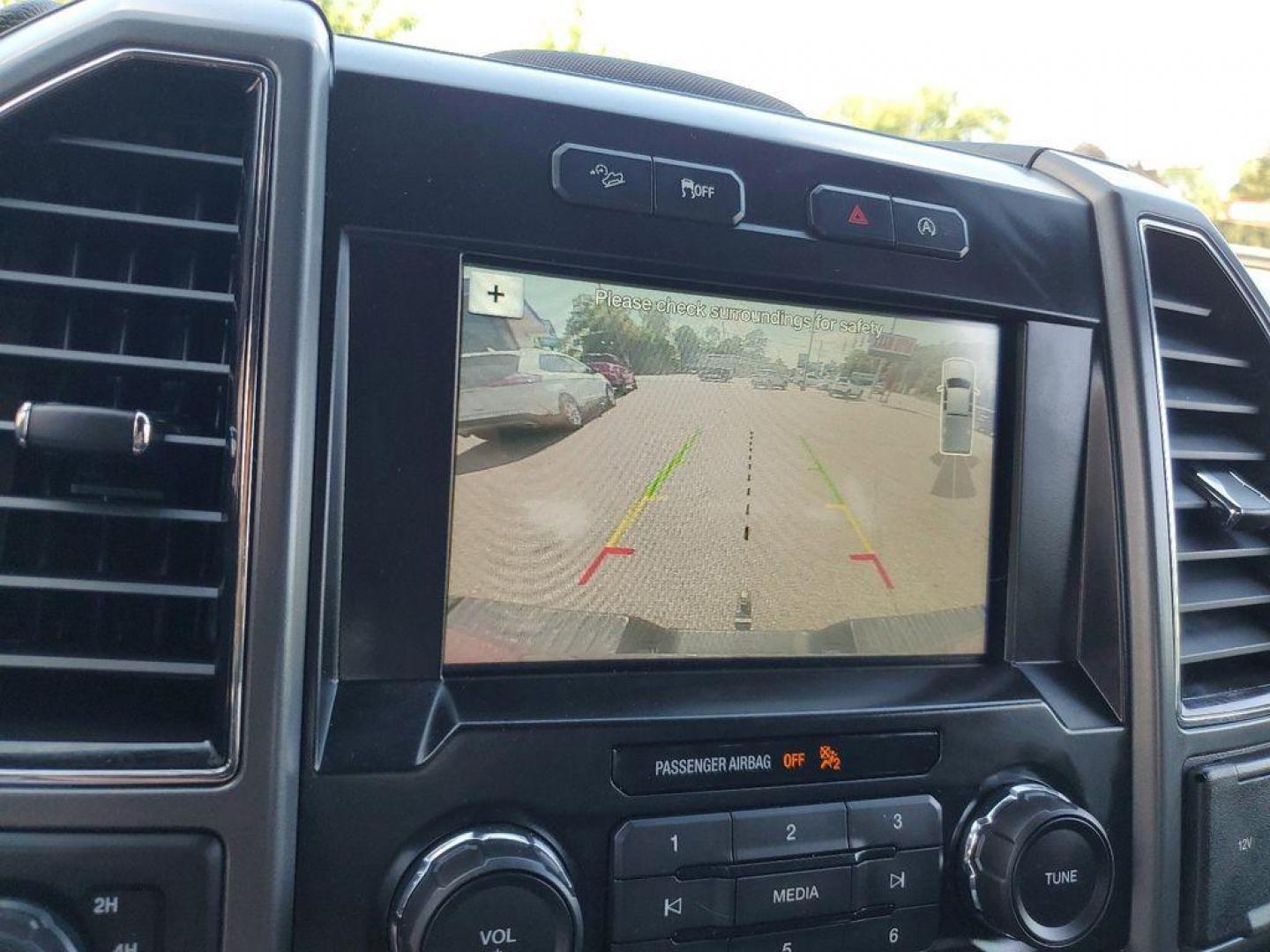 2018 Ruby Red Metallic Tinted Clearcoat /Black Ford F-150 XLT SuperCrew 6.5-ft. Bed 4WD (1FTEW1EP9JF) with an 2.7L V6 DOHC 24V engine, 6A transmission, located at 234 Columbia Ave, Battle Creek, MI, 49015, (269) 222-0088, 42.298264, -85.192543 - Get ready to conquer the road with this outstanding 2018 Ford F-150 XLT 4WD! This powerhouse is equipped with a robust V6, 2.7L engine, delivering impressive performance and efficiency. Whether you're tackling rugged terrains or cruising through city streets, the F-150 XLT is designed to handle it a - Photo#19