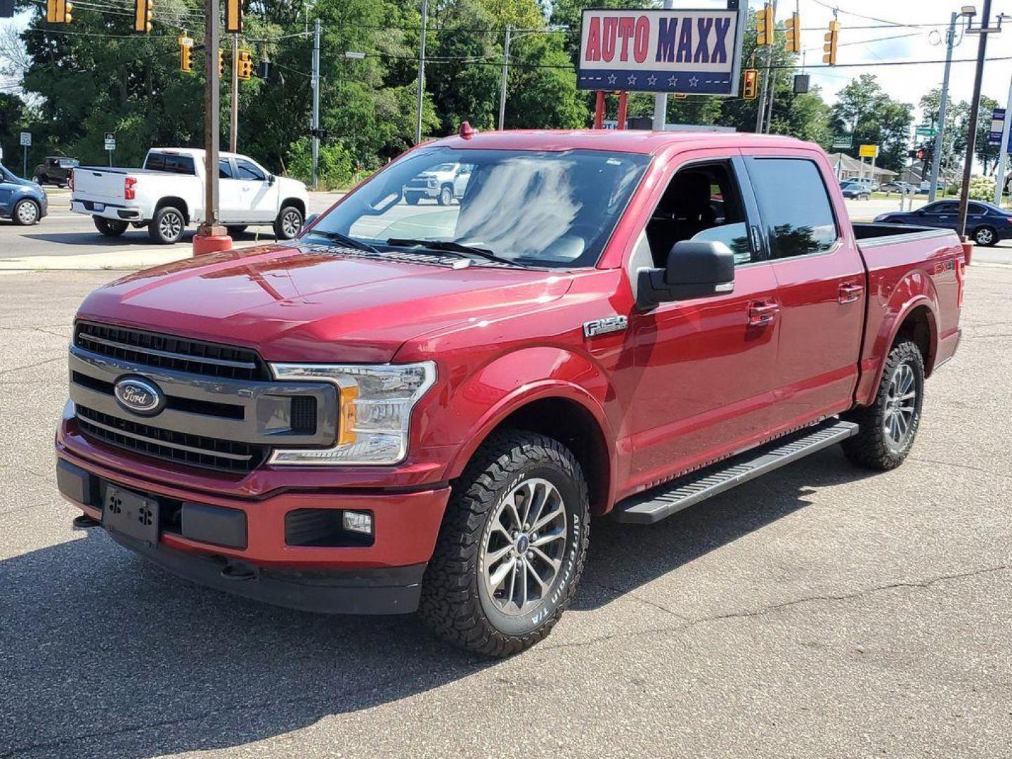 2018 Ruby Red Metallic Tinted Clearcoat /Black Ford F-150 XLT SuperCrew 6.5-ft. Bed 4WD (1FTEW1EP9JF) with an 2.7L V6 DOHC 24V engine, 6A transmission, located at 234 Columbia Ave, Battle Creek, MI, 49015, (269) 222-0088, 42.298264, -85.192543 - Get ready to conquer the road with this outstanding 2018 Ford F-150 XLT 4WD! This powerhouse is equipped with a robust V6, 2.7L engine, delivering impressive performance and efficiency. Whether you're tackling rugged terrains or cruising through city streets, the F-150 XLT is designed to handle it a - Photo#3