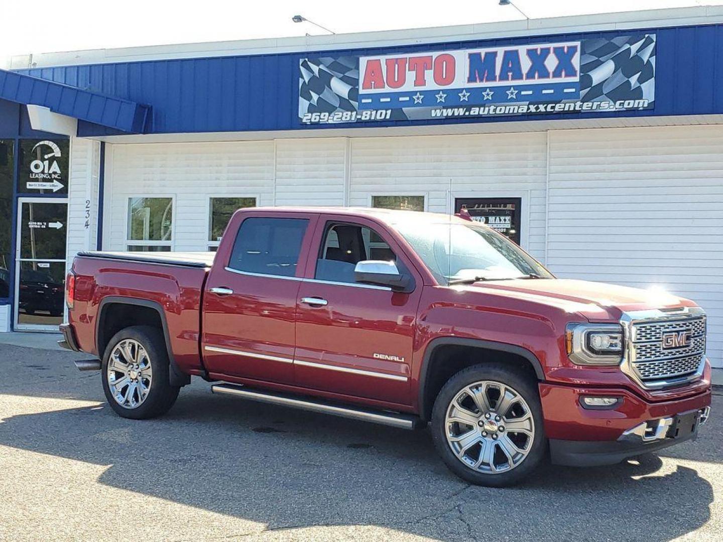 2018 Red Quartz Tintcoat /Jet Black GMC Sierra 1500 Denali Crew Cab Long Box 4WD (3GTU2PEJ9JG) with an 6.2L V8 OHV 16V engine, 6A transmission, located at 234 Columbia Ave, Battle Creek, MI, 49015, (269) 222-0088, 42.298264, -85.192543 - <b>Vehicle Details</b><br>Discover the power and luxury of the 2018 GMC Sierra 1500 Denali at our dealership. This pre-owned gem comes equipped with a robust V8, 6.2L engine and 4WD, ensuring you have the muscle and traction needed for any adventure or tough job. Step inside to experience true com - Photo#0