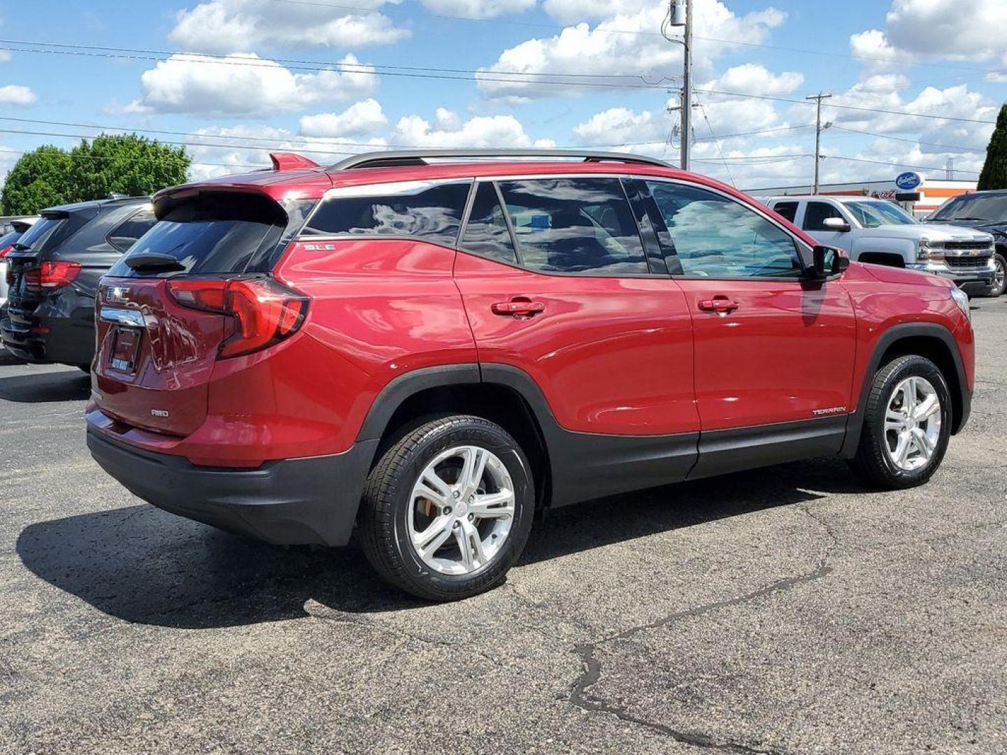 2018 Red Quartz Tintcoat GMC Terrain SLE AWD (3GKALTEV0JL) with an 1.4L L4 DOHC 16V TURBO engine, 6A transmission, located at 6064 Gull Rd, Kalamazoo, MI, 49048, (269) 222-0088, 42.328388, -85.512924 - <b>Vehicle Details</b><br>Discover the perfect blend of functionality and style with our 2018 GMC Terrain SLE, now available at our dealership. This versatile SUV comes equipped with All-Wheel Drive, ensuring you have the confidence to tackle any road conditions, whether it's a daily commute or a we - Photo#3