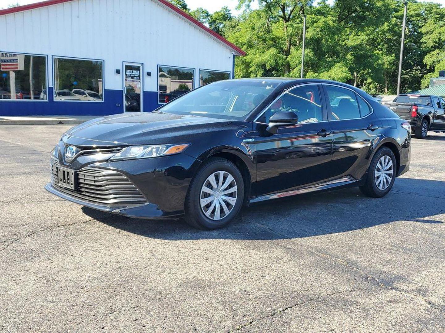 2018 Midnight Black Metallic /Black Toyota Camry Hybrid XLE (4T1B31HK5JU) with an 2.5L L4 DOHC 16V HYBRID engine, CVT transmission, located at 6064 Gull Rd, Kalamazoo, MI, 49048, (269) 222-0088, 42.328388, -85.512924 - <b>Vehicle Details</b><br>For sale at our dealership, we present a meticulously maintained 2018 Toyota Camry Hybrid LE with front-wheel drive and a powerful L4, 2.5L engine. This reliable sedan combines exceptional fuel efficiency with a smooth driving experience, making it an excellent choice for d - Photo#1