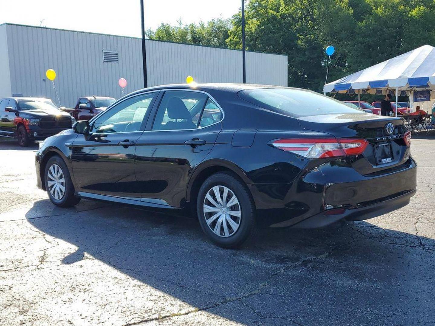 2018 Midnight Black Metallic /Black Toyota Camry Hybrid XLE (4T1B31HK5JU) with an 2.5L L4 DOHC 16V HYBRID engine, CVT transmission, located at 6064 Gull Rd, Kalamazoo, MI, 49048, (269) 222-0088, 42.328388, -85.512924 - <b>Vehicle Details</b><br>For sale at our dealership, we present a meticulously maintained 2018 Toyota Camry Hybrid LE with front-wheel drive and a powerful L4, 2.5L engine. This reliable sedan combines exceptional fuel efficiency with a smooth driving experience, making it an excellent choice for d - Photo#2