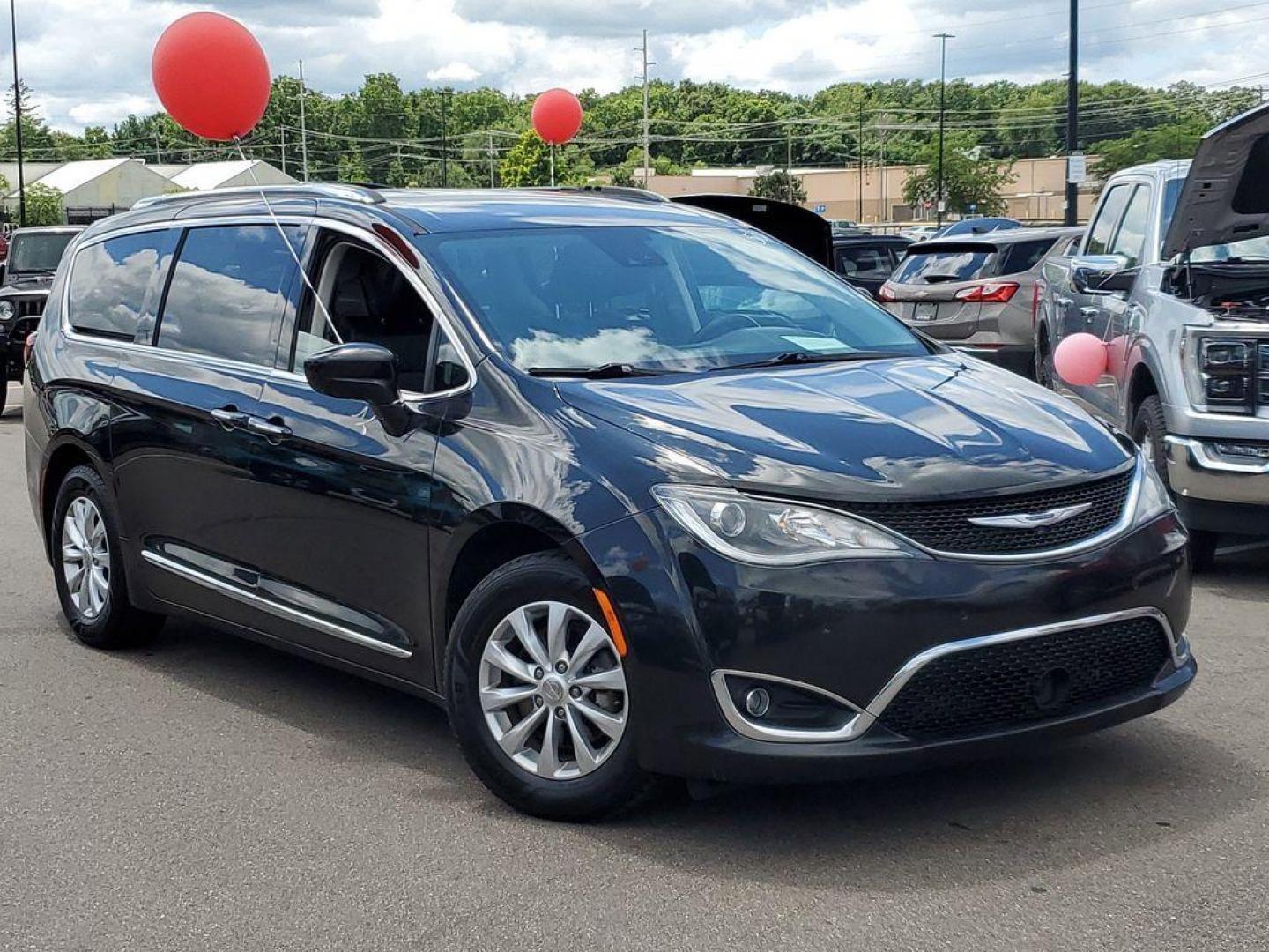 2019 Brilliant Black Crystal Pearlcoat /Black/Alloy Chrysler Pacifica Touring-L (2C4RC1BG4KR) with an 3.6L V6 DOHC 24V engine, 9A transmission, located at 234 Columbia Ave, Battle Creek, MI, 49015, (269) 222-0088, 42.298264, -85.192543 - <b>Vehicle Details</b><br>Discover the ultimate blend of style, comfort, and performance with this exceptional 2019 Chrysler Pacifica Touring L! Perfectly designed for families and adventurers alike, this one-owner gem boasts a clean CARFAX report, ensuring you peace of mind with every drive. The po - Photo#0