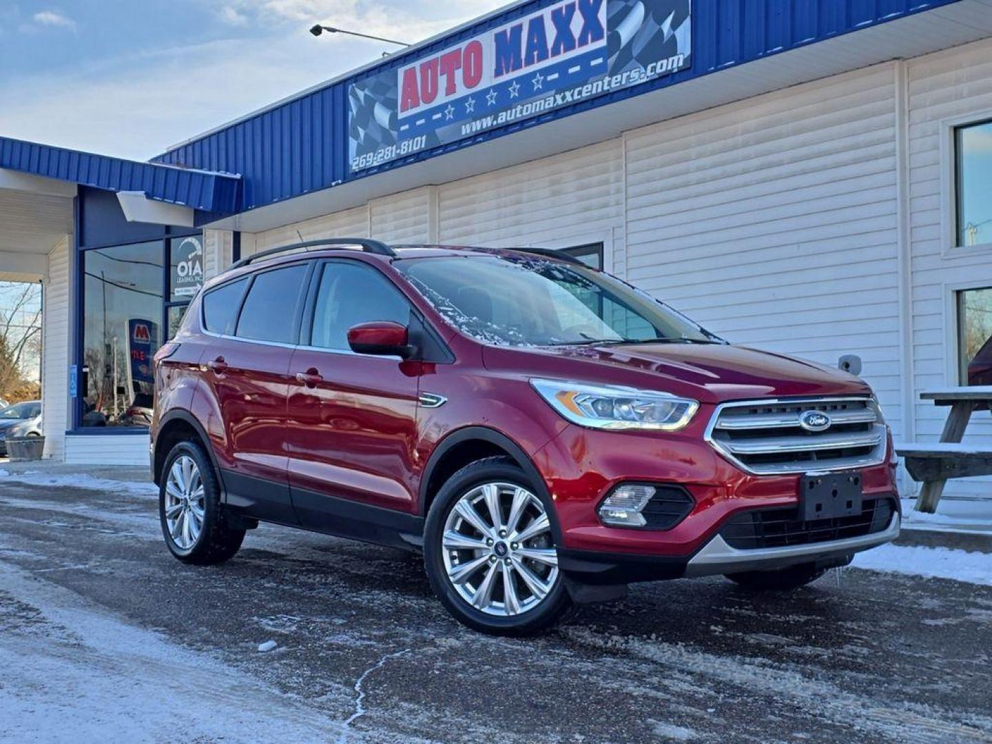 2019 Ruby Red Metallic Tinted Clearcoat /Charcoal Black Ford Escape SEL 4WD (1FMCU9HD2KU) with an 1.5L L4 DOHC 16V engine, 6A transmission, located at 234 Columbia Ave, Battle Creek, MI, 49015, (269) 222-0088, 42.298264, -85.192543 - When you encounter slick or muddy roads, you can engage the four wheel drive on the Ford Escape and drive with confidence. This small suv comes equipped with Android Auto for seamless smartphone integration on the road. Apple CarPlay: Seamless smartphone integration for this vehicle - stay connected - Photo#0