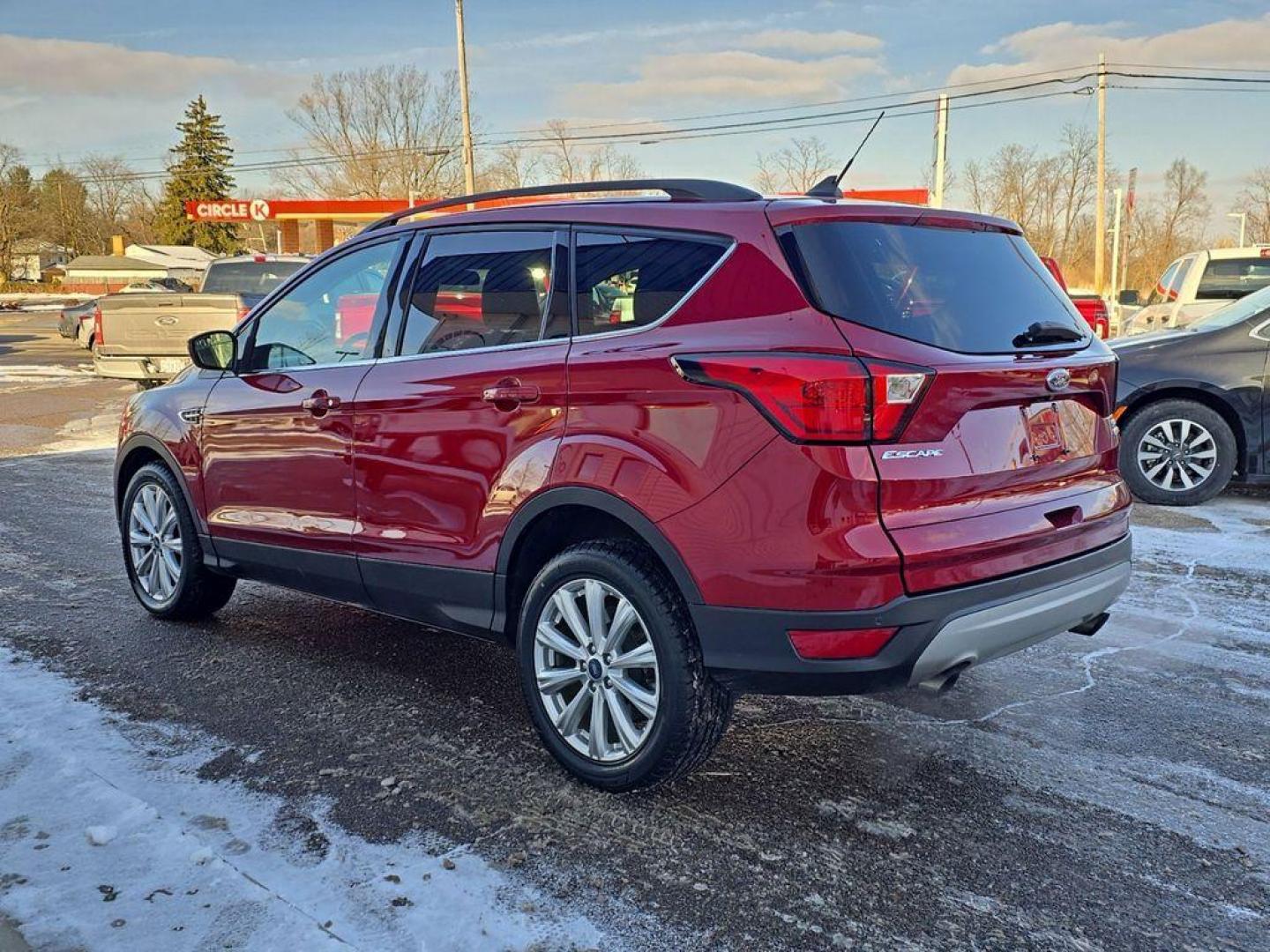 2019 Ruby Red Metallic Tinted Clearcoat /Charcoal Black Ford Escape SEL 4WD (1FMCU9HD2KU) with an 1.5L L4 DOHC 16V engine, 6A transmission, located at 234 Columbia Ave, Battle Creek, MI, 49015, (269) 222-0088, 42.298264, -85.192543 - When you encounter slick or muddy roads, you can engage the four wheel drive on the Ford Escape and drive with confidence. This small suv comes equipped with Android Auto for seamless smartphone integration on the road. Apple CarPlay: Seamless smartphone integration for this vehicle - stay connected - Photo#2