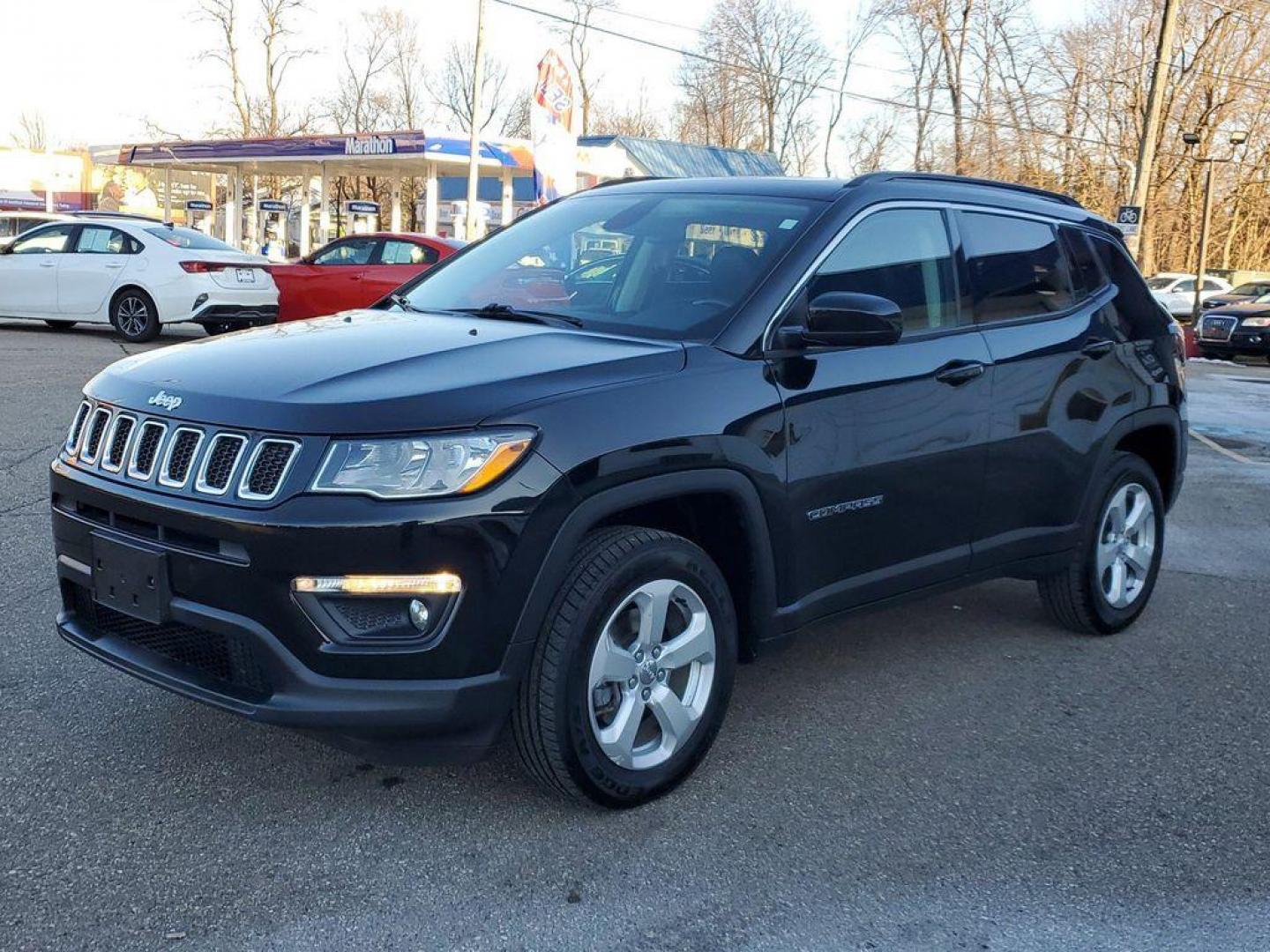 2019 Diamond Black Crystal Pearlcoat /Black Jeep Compass Sport 4WD (3C4NJDBBXKT) with an 2.4L L4 DOHC 16V engine, 9-speed automatic transmission, located at 234 Columbia Ave, Battle Creek, MI, 49015, (269) 222-0088, 42.298264, -85.192543 - <b>Vehicle Details</b><br>Discover the thrill of adventure with the 2019 Jeep Compass Latitude, a versatile SUV designed to elevate every journey. This formidable vehicle is equipped with a robust 4WD system, ensuring you conquer any terrain with confidence. Under the hood, the efficient 4 Cyl, 2.4L - Photo#3