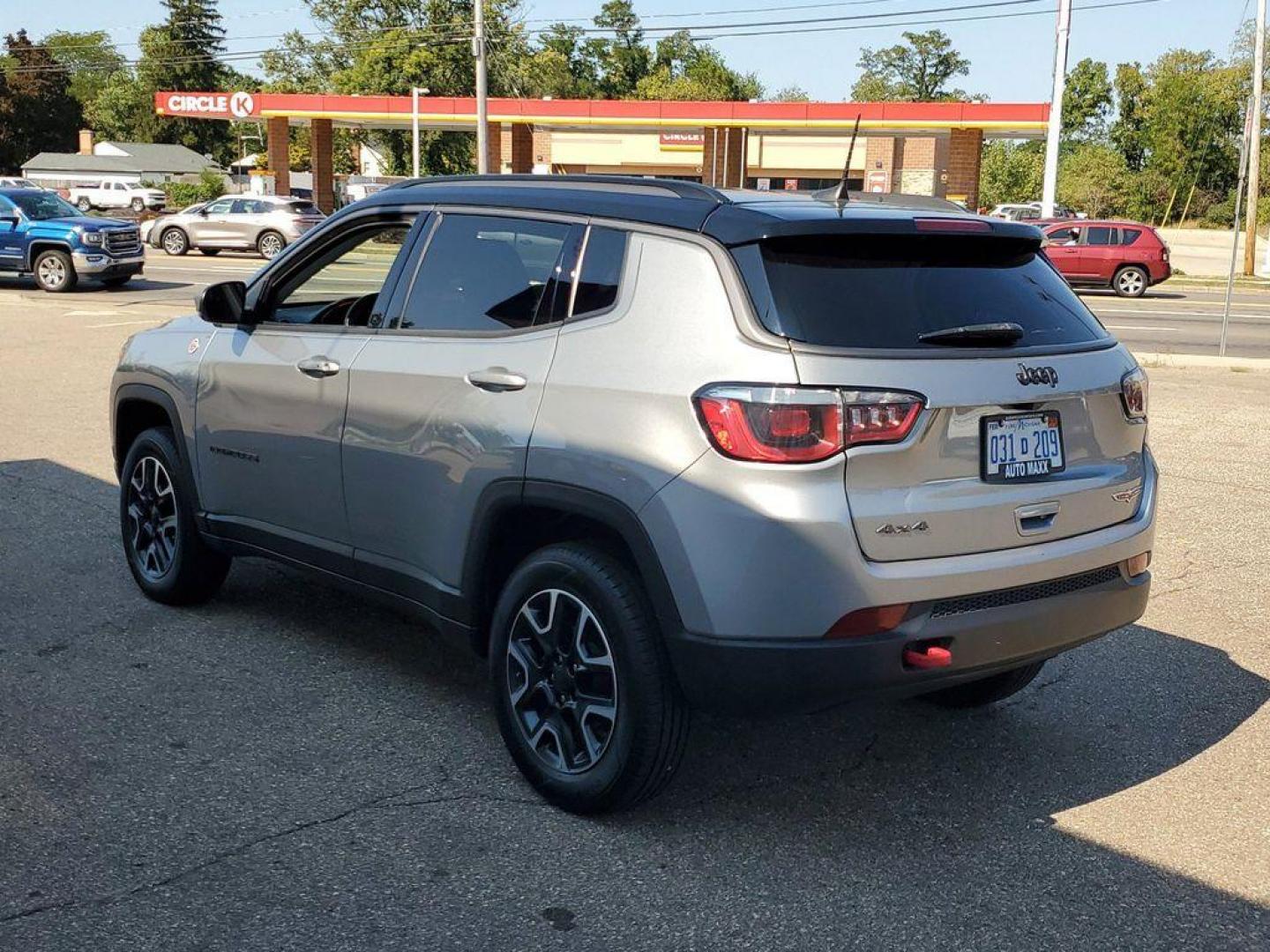 2019 Billet Silver Metallic Clearcoat /Ruby Red/Black Jeep Compass Trailhawk 4WD (3C4NJDDB8KT) with an 2.4L L4 DOHC 16V engine, 9A transmission, located at 234 Columbia Ave, Battle Creek, MI, 49015, (269) 222-0088, 42.298264, -85.192543 - <b>Vehicle Details</b><br>Discover the exceptional 2019 Jeep Compass Trailhawk, a versatile SUV designed for both urban driving and off-road adventures. Equipped with a robust 4WD system and a dependable 4-cylinder, 2.4L engine, this vehicle delivers impressive performance and handling in a variety - Photo#2