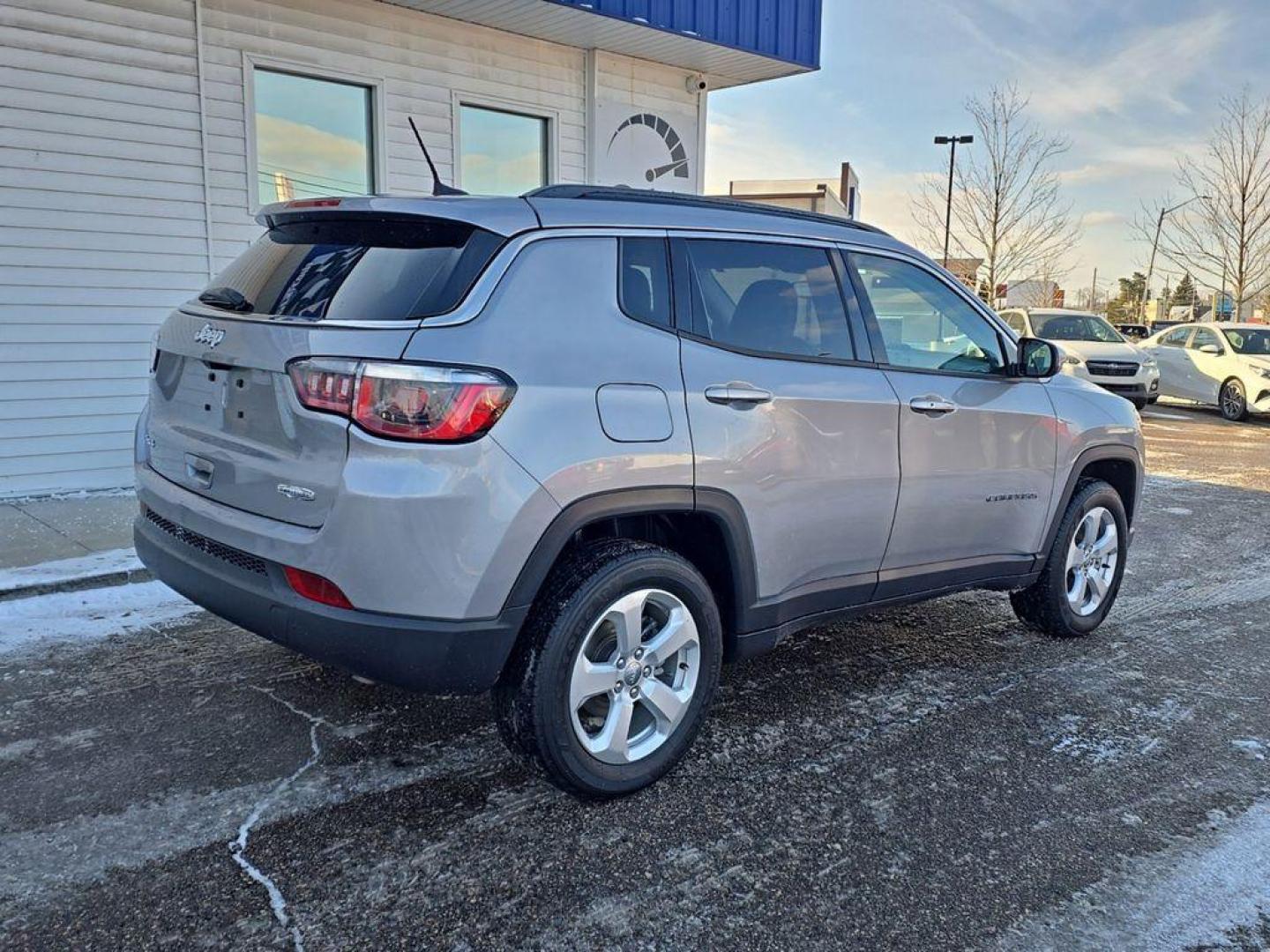 2019 Billet Silver Metallic Clearcoat /Black Jeep Compass Sport 4WD (3C4NJDBB0KT) with an 2.4L L4 DOHC 16V engine, 9-speed automatic transmission, located at 6064 Gull Rd, Kalamazoo, MI, 49048, (269) 222-0088, 42.328388, -85.512924 - When you encounter slick or muddy roads, you can engage the four wheel drive on this unit and drive with confidence. The Jeep Compass offers Android Auto for seamless smartphone integration. Apple CarPlay: Seamless smartphone integration for this unit - stay connected and entertained on the go! It k - Photo#3