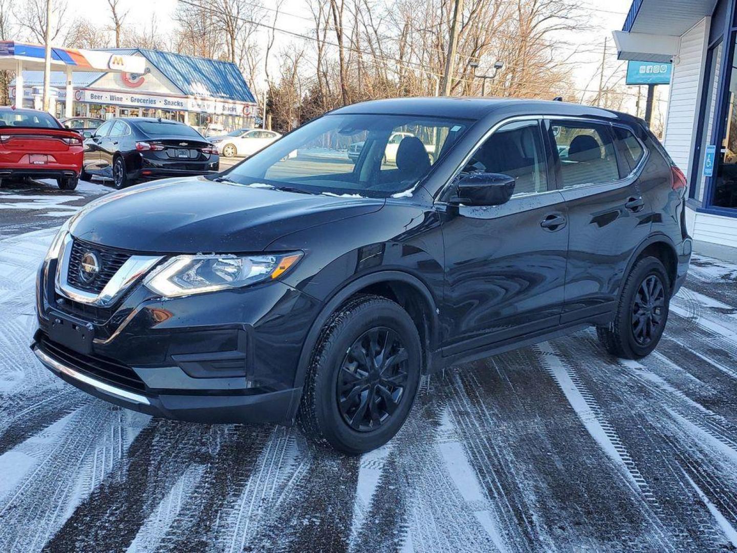 2019 Magnetic Black Pearl /Charcoal Nissan Rogue S AWD (5N1AT2MV9KC) with an 2.5L L4 DOHC 16V engine, CVT transmission, located at 234 Columbia Ave, Battle Creek, MI, 49015, (269) 222-0088, 42.298264, -85.192543 - <b>Vehicle Details</b><br>Discover the perfect blend of versatility and reliability with this 2019 Nissan Rogue S, now available at our dealership. This well-maintained compact SUV is equipped with all-wheel drive, making it an excellent choice for navigating diverse road conditions with confidence. - Photo#3