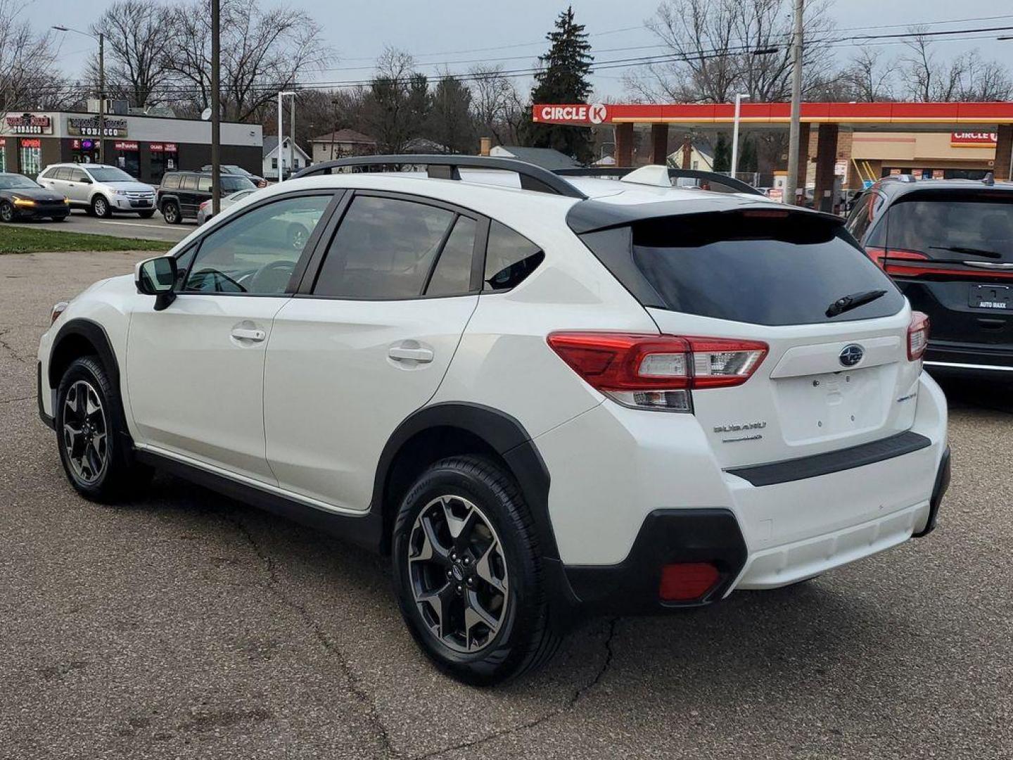 2019 Crystal White Pearl /Black w/Orange Stitching Subaru Crosstrek 2.0i Premium CVT (JF2GTACC8KH) with an 2.0L L4 DOHC 16V engine, CVT transmission, located at 234 Columbia Ave, Battle Creek, MI, 49015, (269) 222-0088, 42.298264, -85.192543 - <b>Vehicle Details</b><br>Get ready to explore the road less traveled with this stunning 2019 Subaru Crosstrek Premium! Perfectly blending adventure-ready capability with everyday practicality, this versatile SUV is your ticket to freedom. Equipped with Subarus legendary All-Wheel Drive, the Crosstr - Photo#2