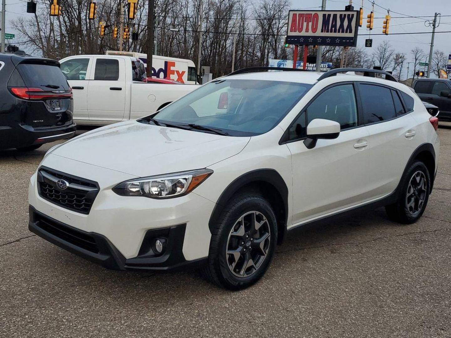 2019 Crystal White Pearl /Black w/Orange Stitching Subaru Crosstrek 2.0i Premium CVT (JF2GTACC8KH) with an 2.0L L4 DOHC 16V engine, CVT transmission, located at 234 Columbia Ave, Battle Creek, MI, 49015, (269) 222-0088, 42.298264, -85.192543 - <b>Vehicle Details</b><br>Get ready to explore the road less traveled with this stunning 2019 Subaru Crosstrek Premium! Perfectly blending adventure-ready capability with everyday practicality, this versatile SUV is your ticket to freedom. Equipped with Subarus legendary All-Wheel Drive, the Crosstr - Photo#3