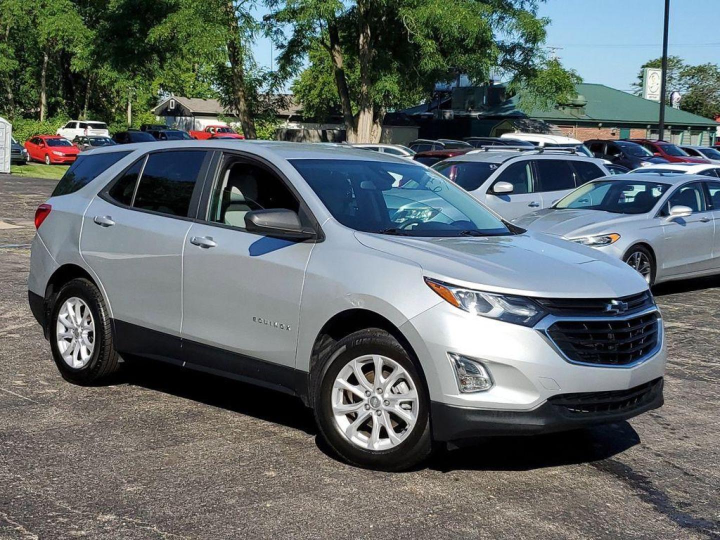 2020 Silver Ice Metallic /Medium Ash Gray Chevrolet Equinox LS 1.5 AWD (3GNAXSEV4LS) with an 1.5L L4 DOHC 16V TURBO engine, 6A transmission, located at 6064 Gull Rd, Kalamazoo, MI, 49048, (269) 222-0088, 42.328388, -85.512924 - <b>Vehicle Details</b><br>Discover the perfect blend of style, versatility, and performance with this stunning 2020 Chevrolet Equinox LS! This exceptional SUV is designed to elevate your driving experience with its impressive features and advanced technology. Equipped with a robust L4, 1.5L turbocha - Photo#0