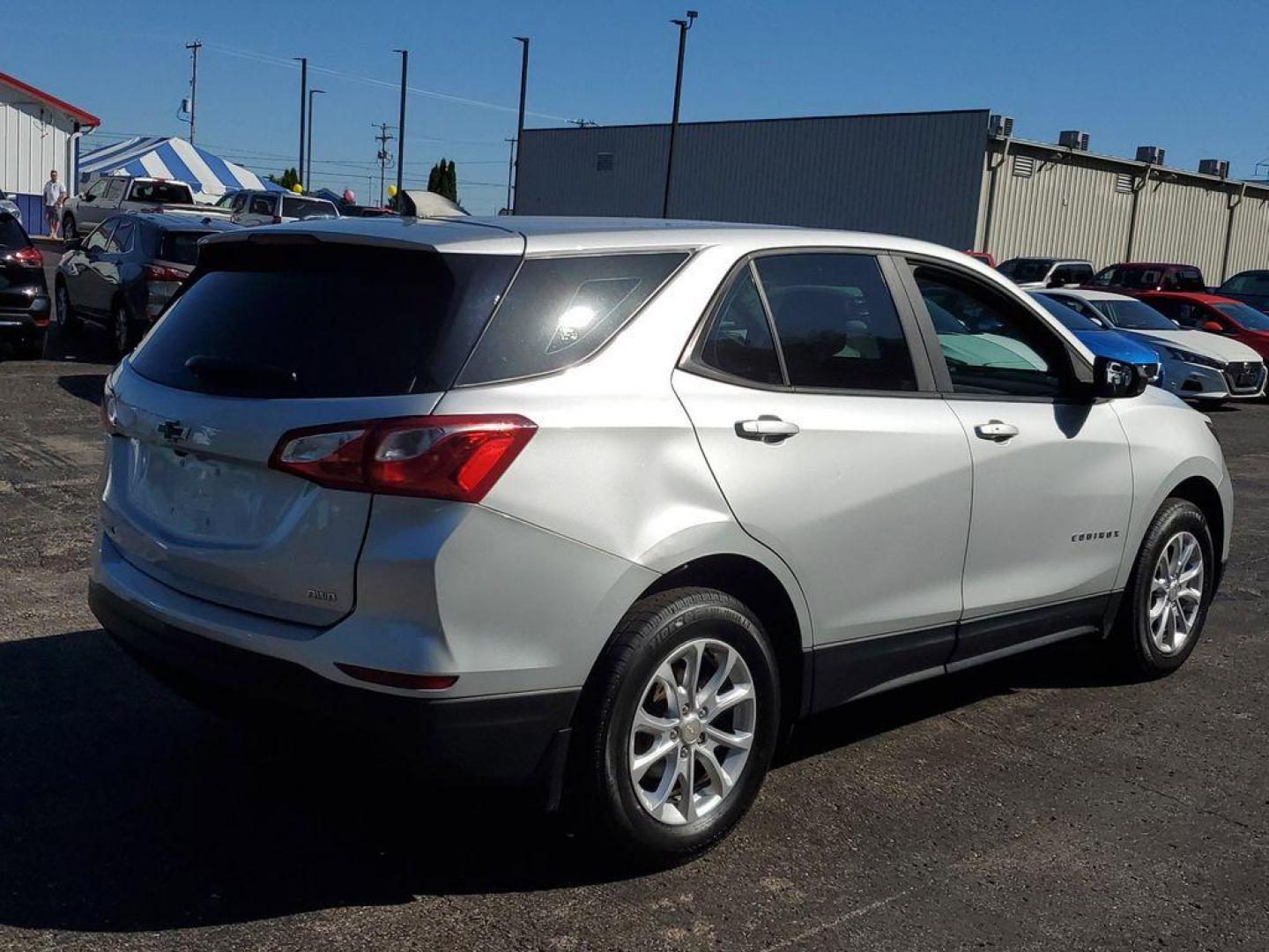 2020 Silver Ice Metallic /Medium Ash Gray Chevrolet Equinox LS 1.5 AWD (3GNAXSEV4LS) with an 1.5L L4 DOHC 16V TURBO engine, 6A transmission, located at 6064 Gull Rd, Kalamazoo, MI, 49048, (269) 222-0088, 42.328388, -85.512924 - <b>Vehicle Details</b><br>Discover the perfect blend of style, versatility, and performance with this stunning 2020 Chevrolet Equinox LS! This exceptional SUV is designed to elevate your driving experience with its impressive features and advanced technology. Equipped with a robust L4, 1.5L turbocha - Photo#1