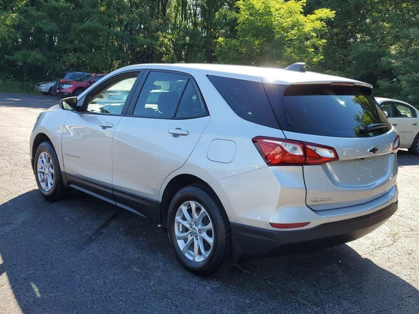 2020 Silver Ice Metallic /Medium Ash Gray Chevrolet Equinox LS 1.5 AWD (3GNAXSEV4LS) with an 1.5L L4 DOHC 16V TURBO engine, 6A transmission, located at 6064 Gull Rd, Kalamazoo, MI, 49048, (269) 222-0088, 42.328388, -85.512924 - <b>Vehicle Details</b><br>Discover the perfect blend of style, versatility, and performance with this stunning 2020 Chevrolet Equinox LS! This exceptional SUV is designed to elevate your driving experience with its impressive features and advanced technology. Equipped with a robust L4, 1.5L turbocha - Photo#2