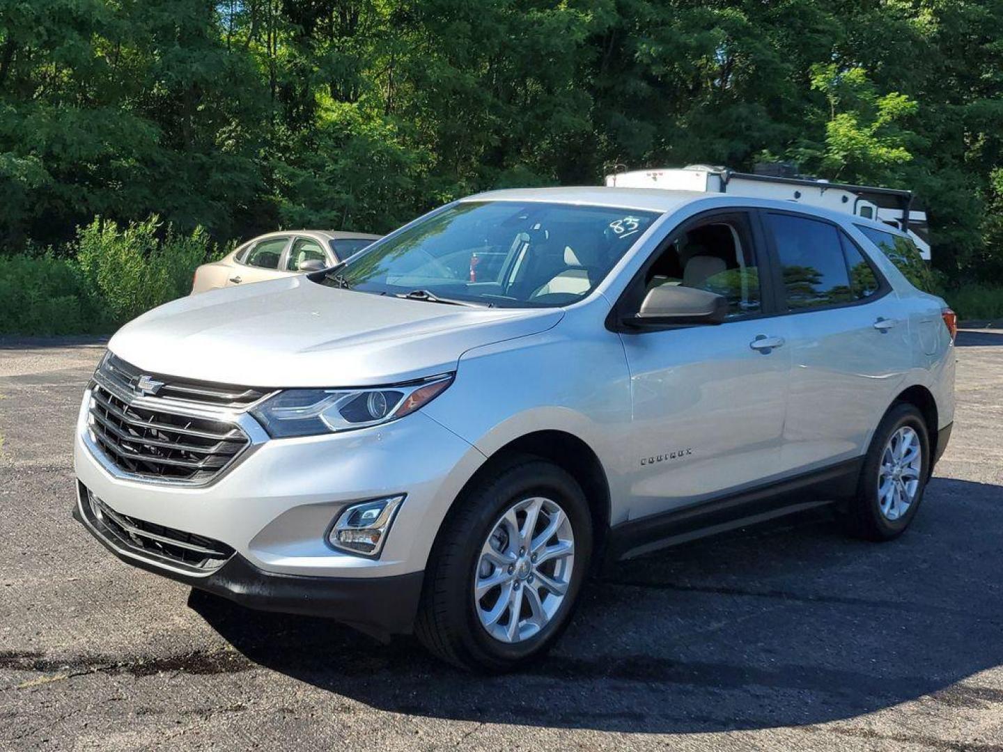 2020 Silver Ice Metallic /Medium Ash Gray Chevrolet Equinox LS 1.5 AWD (3GNAXSEV4LS) with an 1.5L L4 DOHC 16V TURBO engine, 6A transmission, located at 6064 Gull Rd, Kalamazoo, MI, 49048, (269) 222-0088, 42.328388, -85.512924 - <b>Vehicle Details</b><br>Discover the perfect blend of style, versatility, and performance with this stunning 2020 Chevrolet Equinox LS! This exceptional SUV is designed to elevate your driving experience with its impressive features and advanced technology. Equipped with a robust L4, 1.5L turbocha - Photo#3