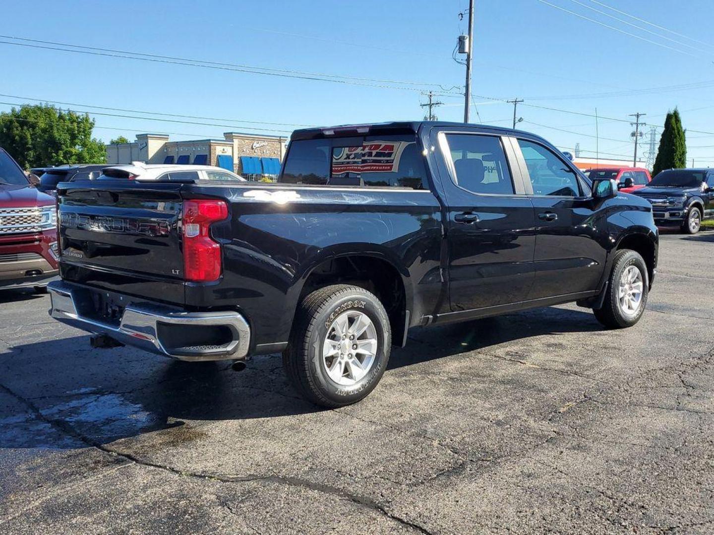 2020 BLACK /Jet Black Chevrolet Silverado 1500 LT Crew Cab 4WD (3GCPYDEK1LG) with an 2.7L L4 DOHC 16V TURBO engine, 6A transmission, located at 6064 Gull Rd, Kalamazoo, MI, 49048, (269) 222-0088, 42.328388, -85.512924 - <b>Vehicle Details</b><br>Discover unbeatable value with our 2020 Chevrolet Silverado 1500 LT, now available at our dealership. This rugged yet refined pickup is equipped with a robust L4, 2.7L engine and 4WD, ensuring powerful performance and exceptional handling in any terrain. This Silverado 150 - Photo#3