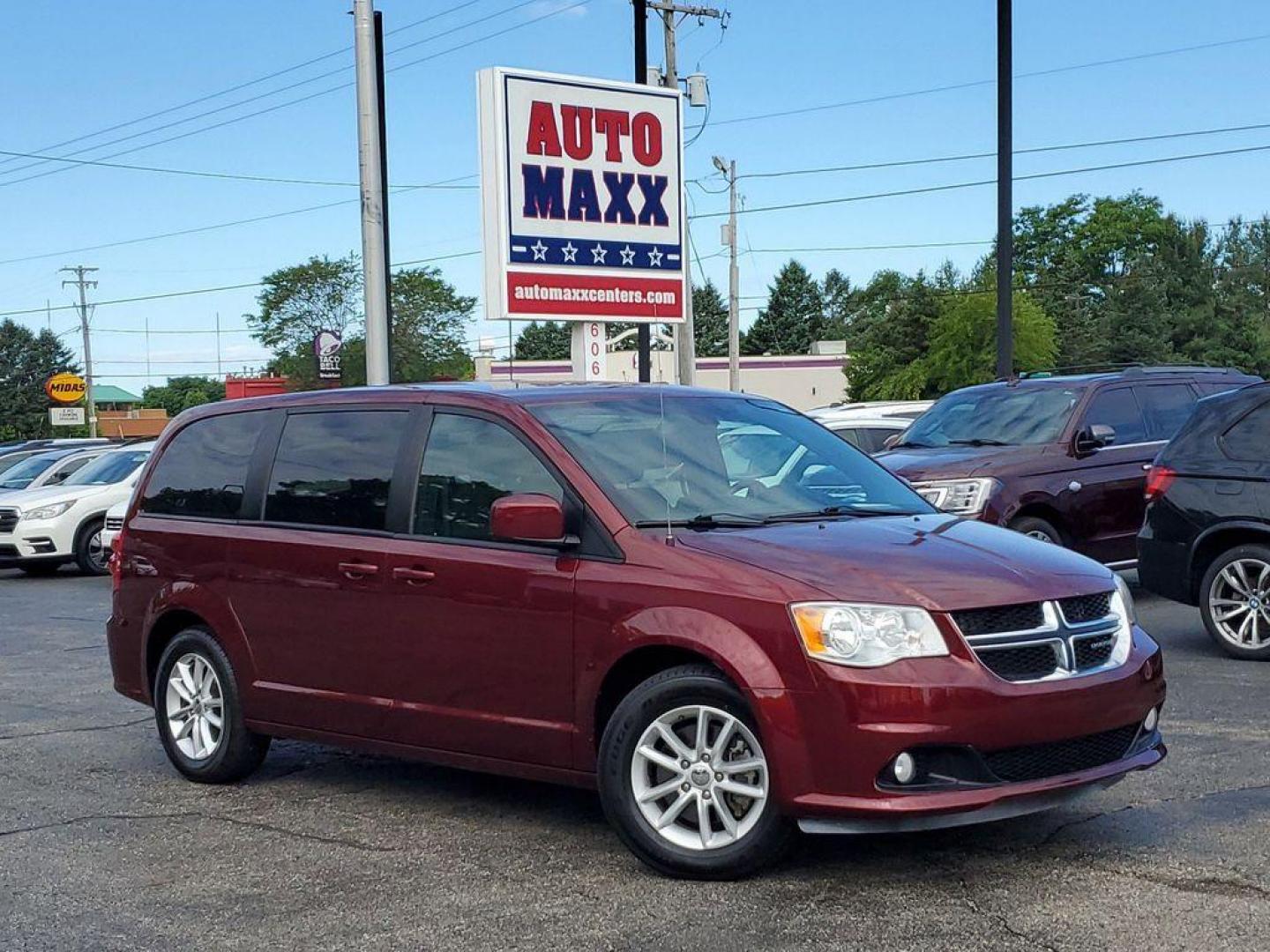 2020 Octane Red Pearlcoat /Black Dodge Grand Caravan SE (2C4RDGBG4LR) with an 3.6L V6 DOHC 24V engine, 6A transmission, located at 6064 Gull Rd, Kalamazoo, MI, 49048, (269) 222-0088, 42.328388, -85.512924 - For those seeking a versatile and reliable family vehicle, look no further than this stunning 2020 Dodge Grand Caravan SE Plus! This exceptional minivan is designed to meet all your driving needs with style, comfort, and power. <br><br>Under the hood, you'll find a robust V6, 3.6L engine that delive - Photo#0