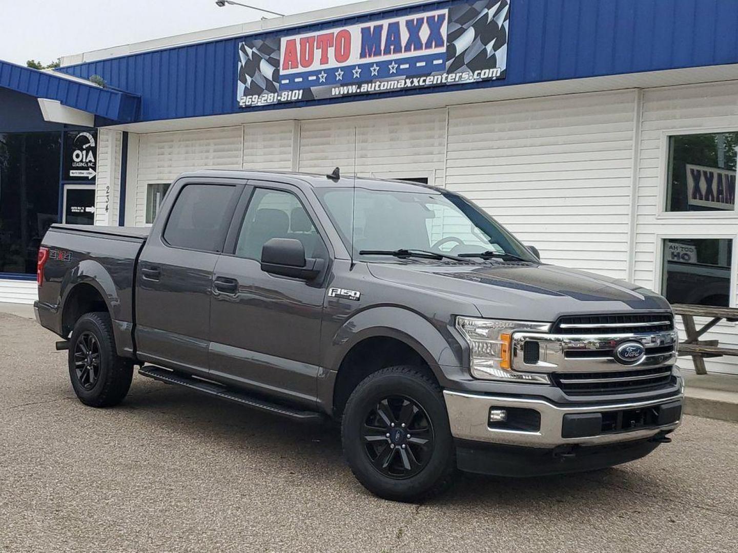 2020 Magnetic /Medium Earth Grey Ford F-150 XLT SuperCrew 6.5-ft. Bed 4WD (1FTEW1E43LF) with an 3.5L V6 TURBO engine, 6A transmission, located at 234 Columbia Ave, Battle Creek, MI, 49015, (269) 222-0088, 42.298264, -85.192543 - <b>Vehicle Details</b><br>Introducing the exceptional 2020 Ford F-150 XLT, now available at our esteemed dealership. This impressive used pickup truck combines raw power with advanced features, making it the perfect choice for both work and leisure. With a remarkable 119,811 miles on the odometer, t - Photo#0