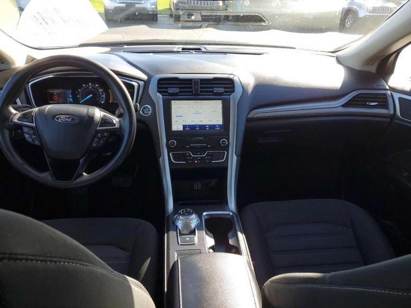 2020 Magnetic Metallic /Ebony Ford Fusion SE (3FA6P0HD6LR) with an 1.5L L4 DOHC 16V engine, 6A transmission, located at 6064 Gull Rd, Kalamazoo, MI, 49048, (269) 222-0088, 42.328388, -85.512924 - Introducing the 2020 Ford Fusion SE, a standout in its class, known for its reliability and sleek design. This model comes equipped with Front-Wheel Drive (FWD) and a robust L4, 1.5L engine, delivering a balance of power and efficiency, making it an ideal choice for both city commuting and highway a - Photo#10